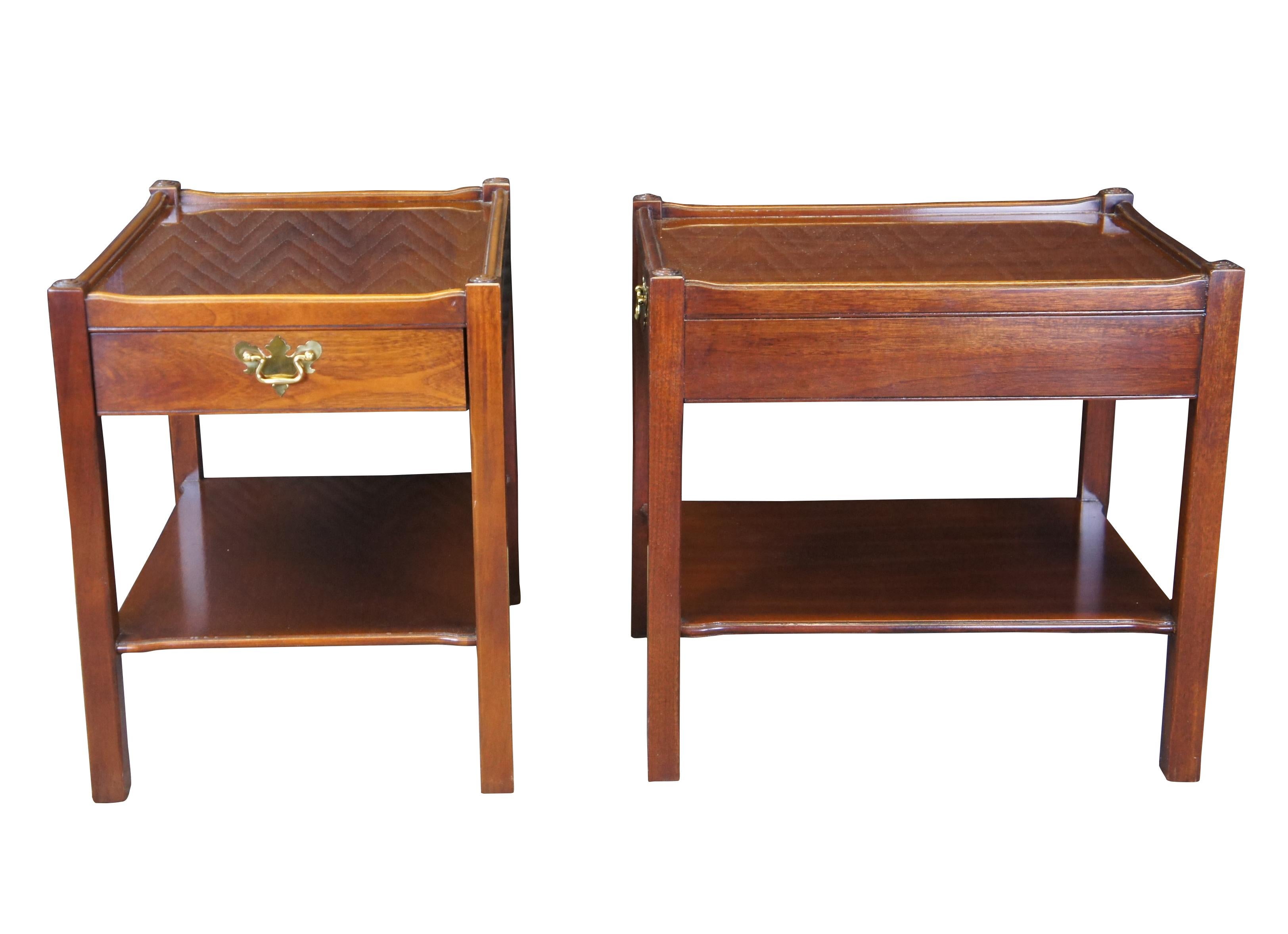 2 Hickory Chair Historic James River Collection side tables, circa 1996.  Inspired by English & Georgian styling.  A rectangular inset top made from mahogany with an oak dovetailed drawer with brass batwing hardware and lower shelf.  The tables are