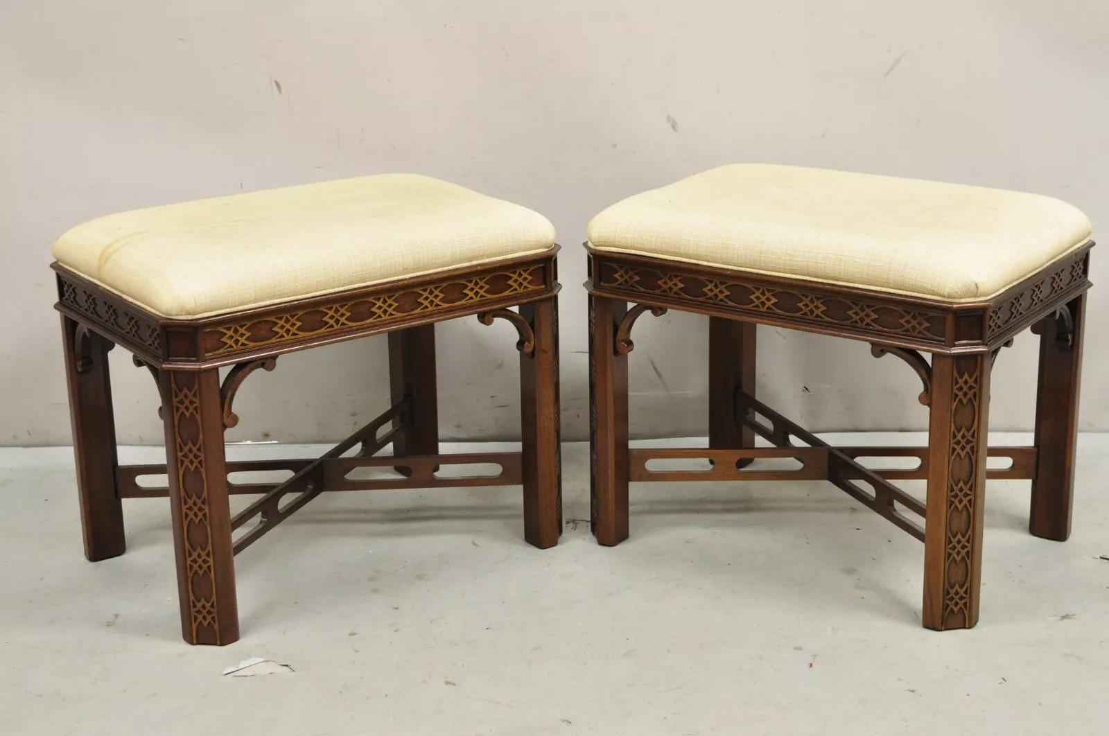 Vintage Hickory Chinese Chippendale Style Mahogany Fretwork Console Table Stool Set - 3 pc Set. Listing includes a banded top stretcher base hall table and a pair of matching cross stretcher base upholstered stools. Circa Late 20th Century.