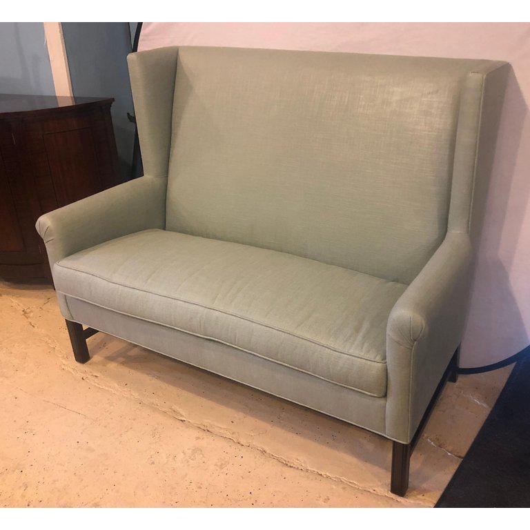 Hickory Co Charles Stewart Chippendale Style Settee or Loveseat in Green Linen
A Hickory Furniture Company by Charles Stewart tweed linen Chippendale style wing backed settee - loveseat or sofa. This finely covered loveseat or sofa is simply