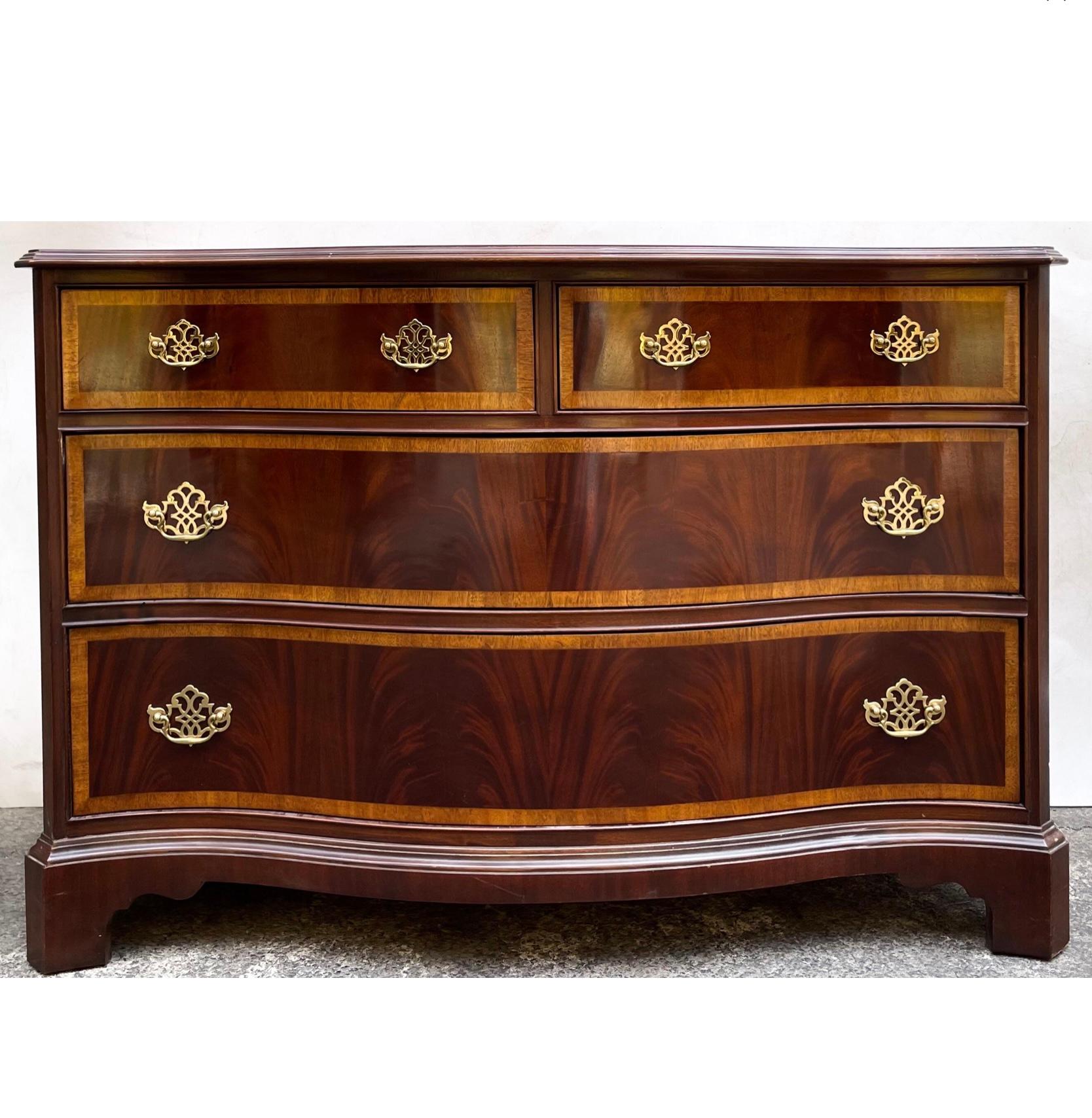 20th Century Hickory Furniture Chippendale Style Flame Mahogany Serpentine Chest - Pair For Sale