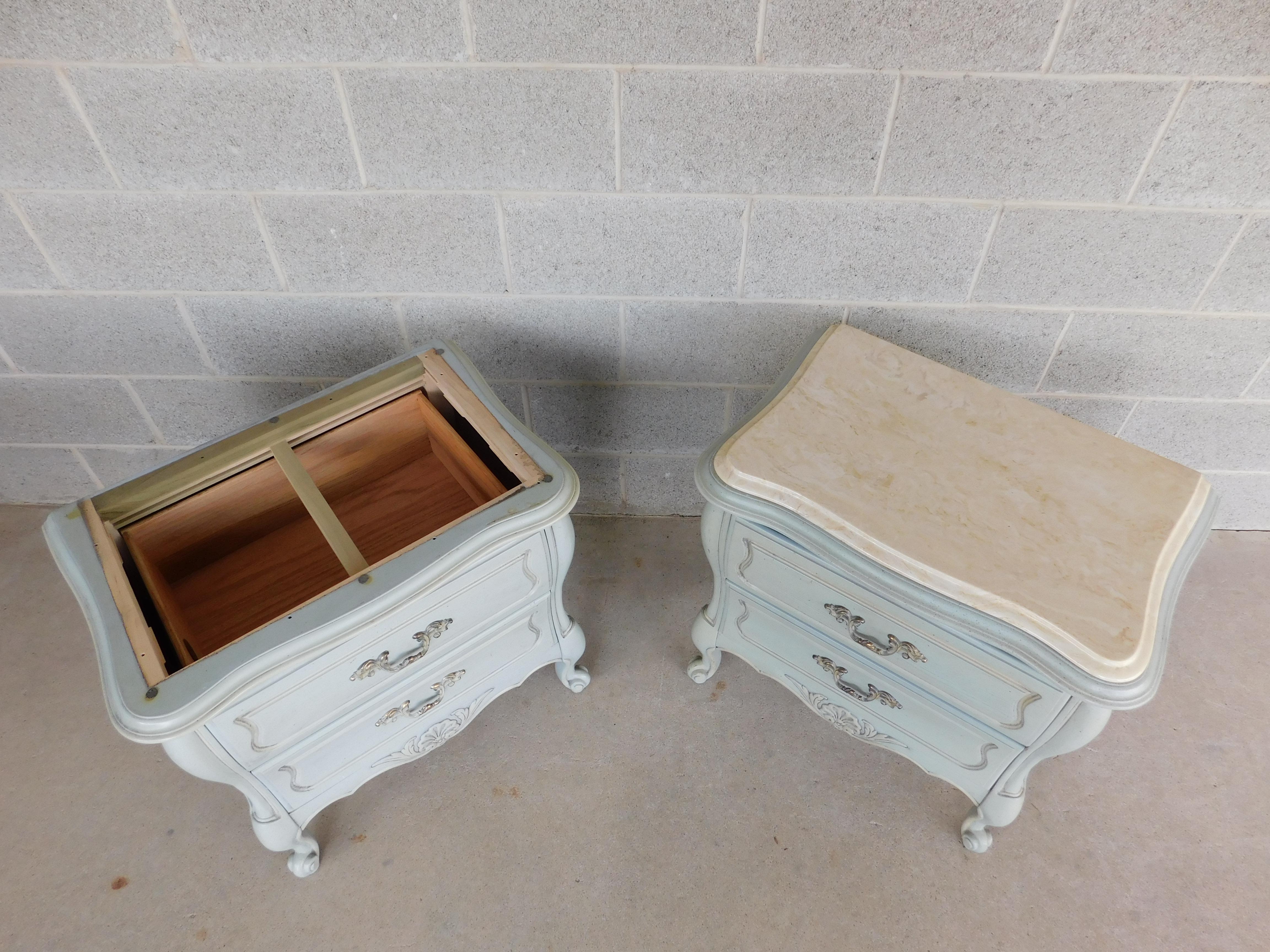 Marble top over original French powder blue finish. Brass pulls on 2 dovetailed drawers.