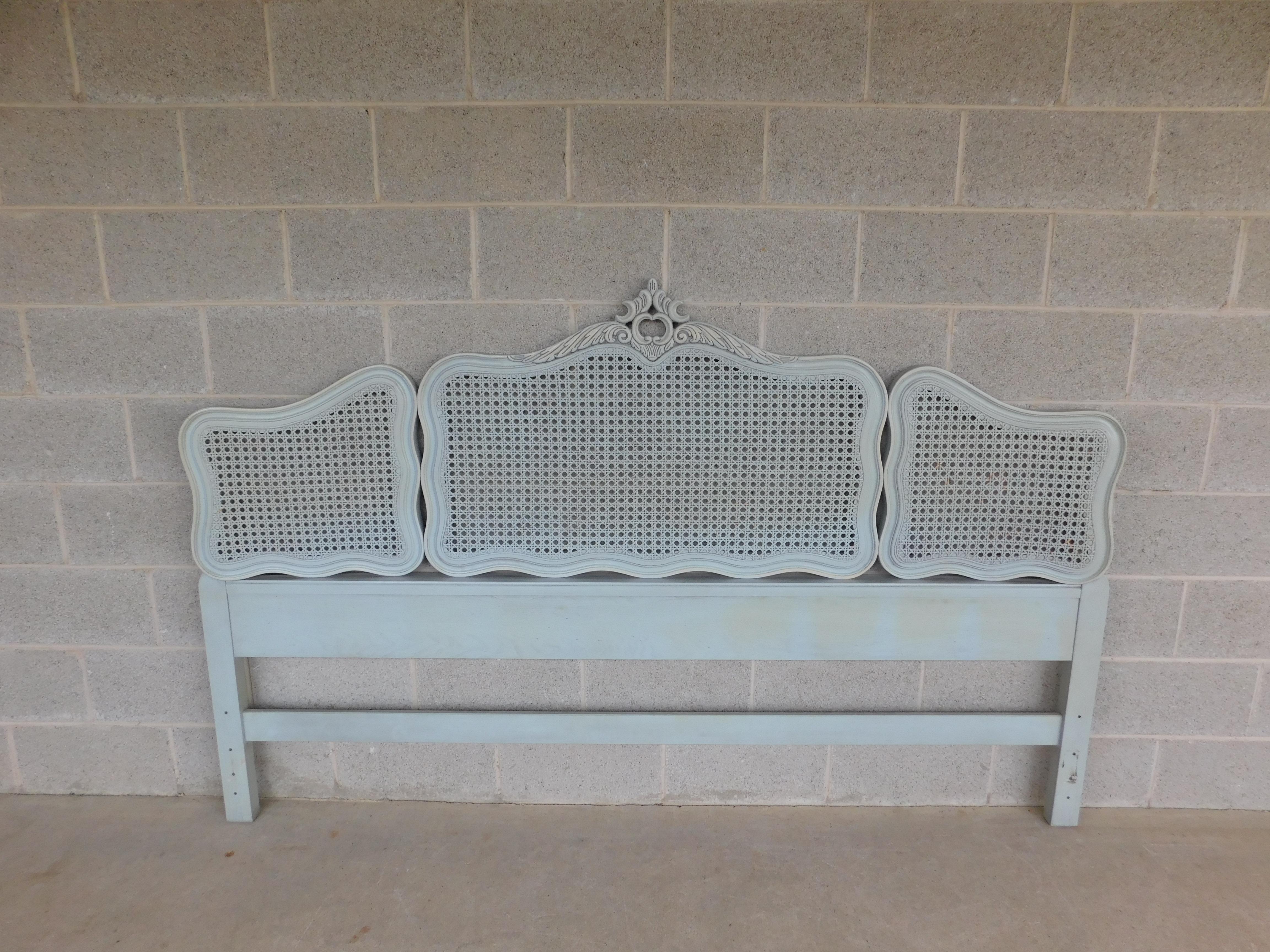 King size headboard. Features 3 part caned back finished in french blue original finish, The left and right corners bevel outward approx 5 inches.