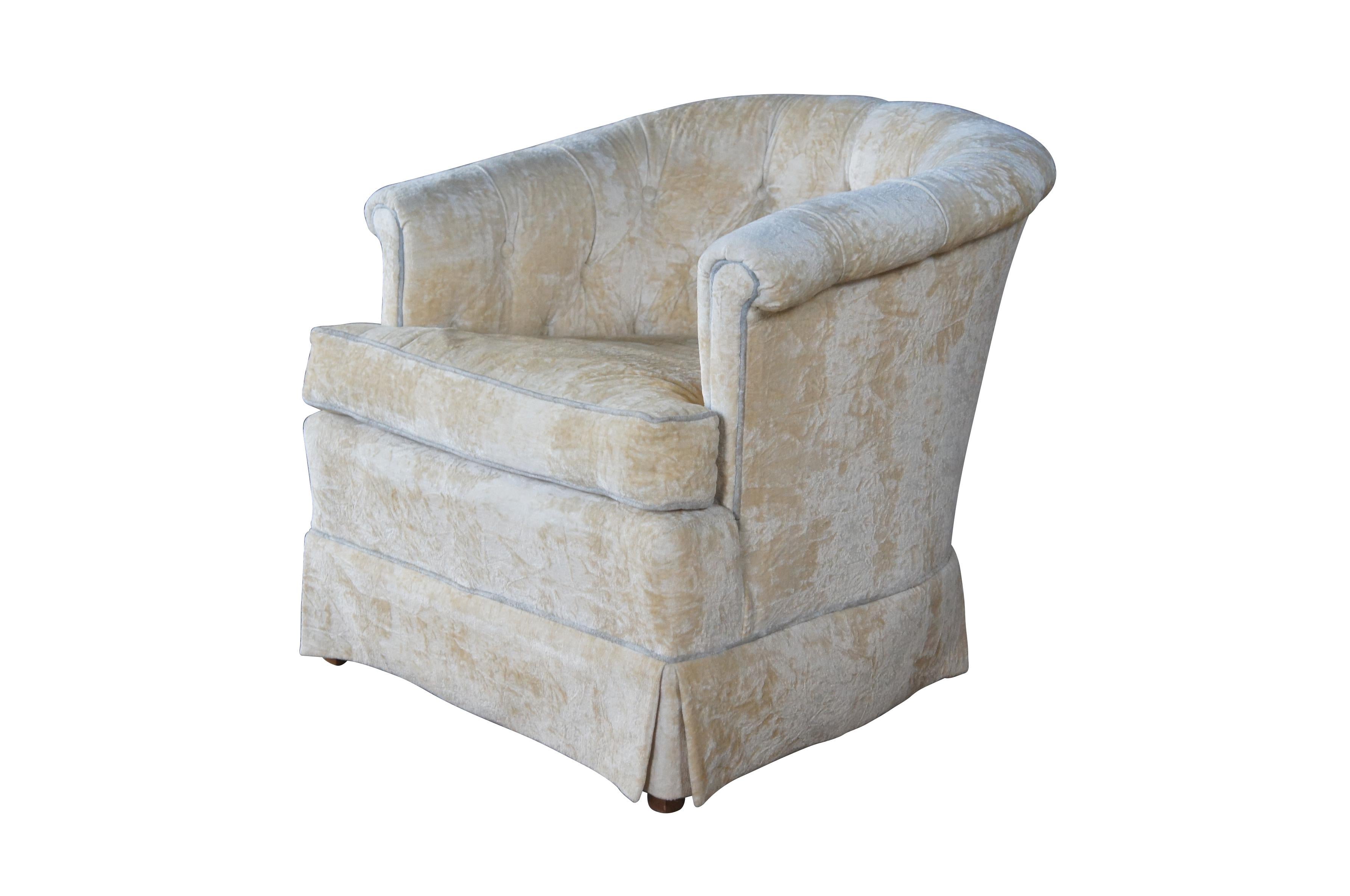 Mid century Hickory Tavern barrel back club chair featuring off cream and baby blue textured velvet with tufted back and skirted base.  Made in Hickory North Carolina.

Dimensions:
31