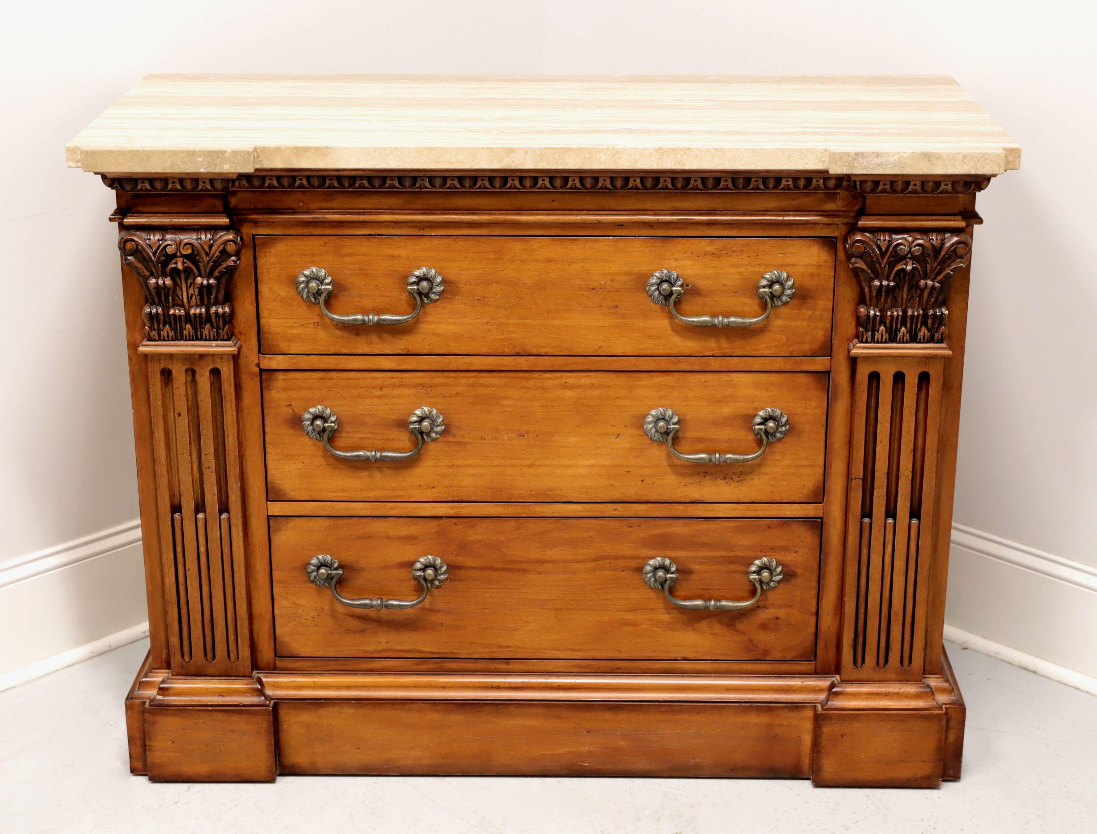 A Neoclassical style bachelor chest by Hickory White. Solid hardwood with their Cotsworth finish, brass hardware, marble top and carved decorative Corinthian columns to the front corners. Features three drawers of dovetail construction. Made in the