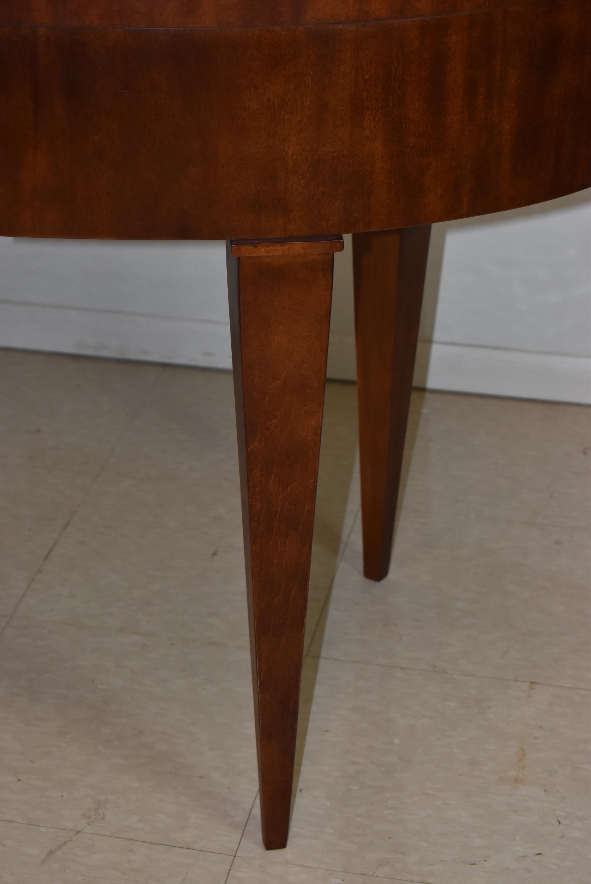 Great design oval burl wood and mahogany contemporary desk by Hickory White Furniture. Stylized tapered legs. Very nice to excellent condition. 62.5