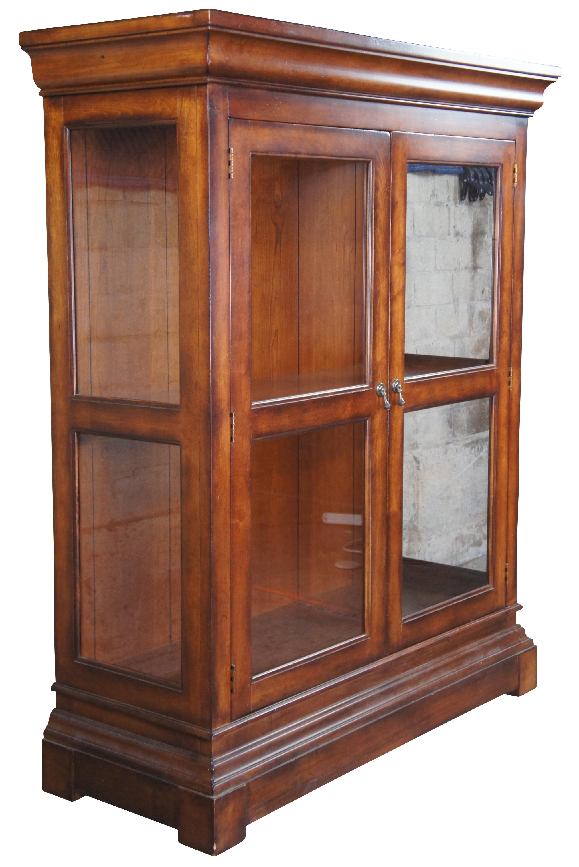The perfect sized bookcase by Hickory White. Traditional styling in their spice finish. Medium wood tone with one fixed interior shelf. Room for 2 additional shelves. 23351-23. Measure: 56