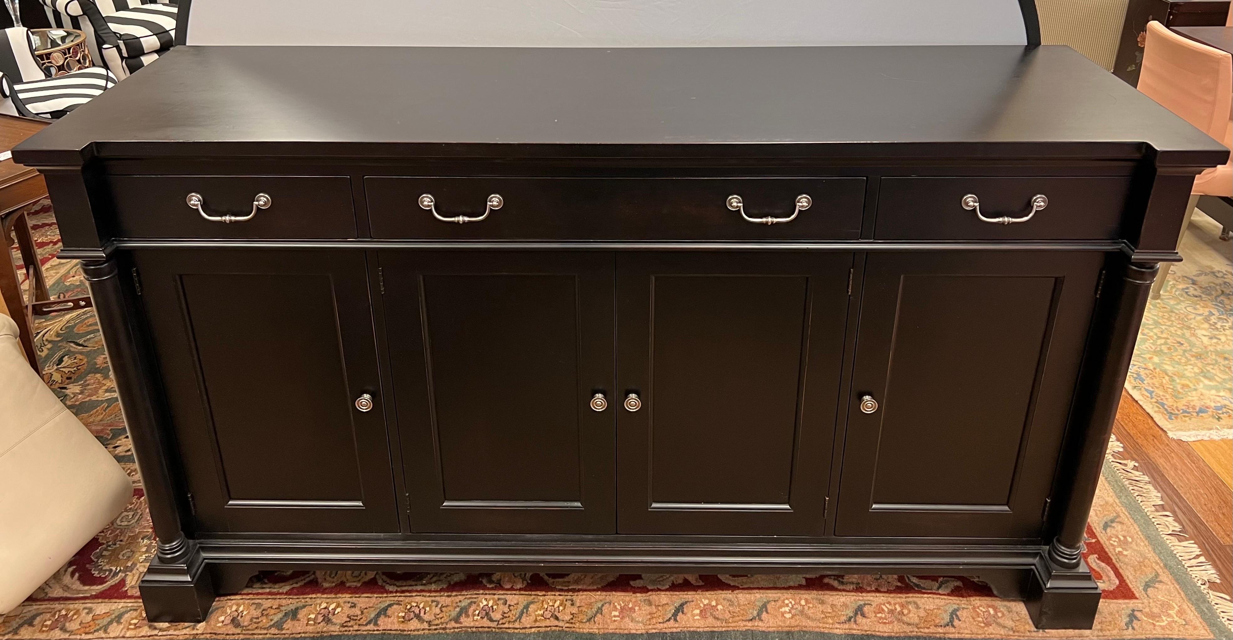 Large Hickory White hand crafted black sideboard can be used to serving food, decorating a buffet, and mindful storage of your kitchen and dining essentials.  The clean - lined silhouette offers four top dovetailed drawers and one double-door