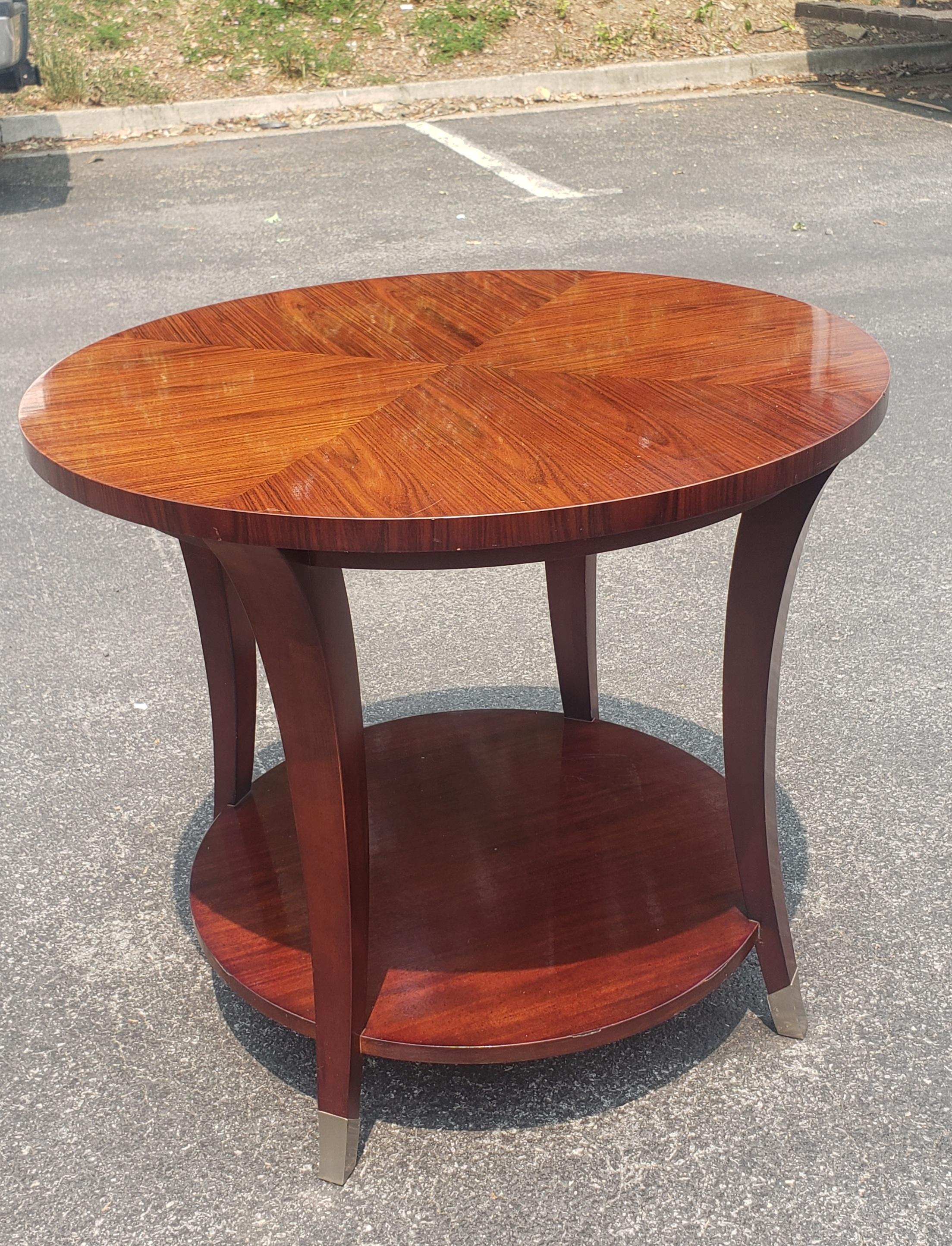 A quality late 20th century Hickory White Two Tier Round Cherry Side or Center Table in very good vintage condition. 
Measures 30