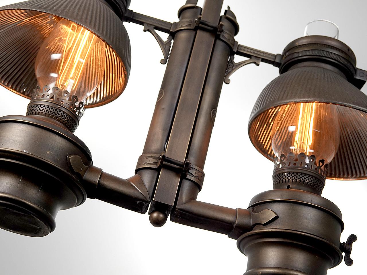Few of these luxury class Victorian RR lamps still exist. Any remaining examples have found their way into museums and RR car restorations. This is a beautiful double chandelier. We carefully wired each burner to now take a standard light bulb. The