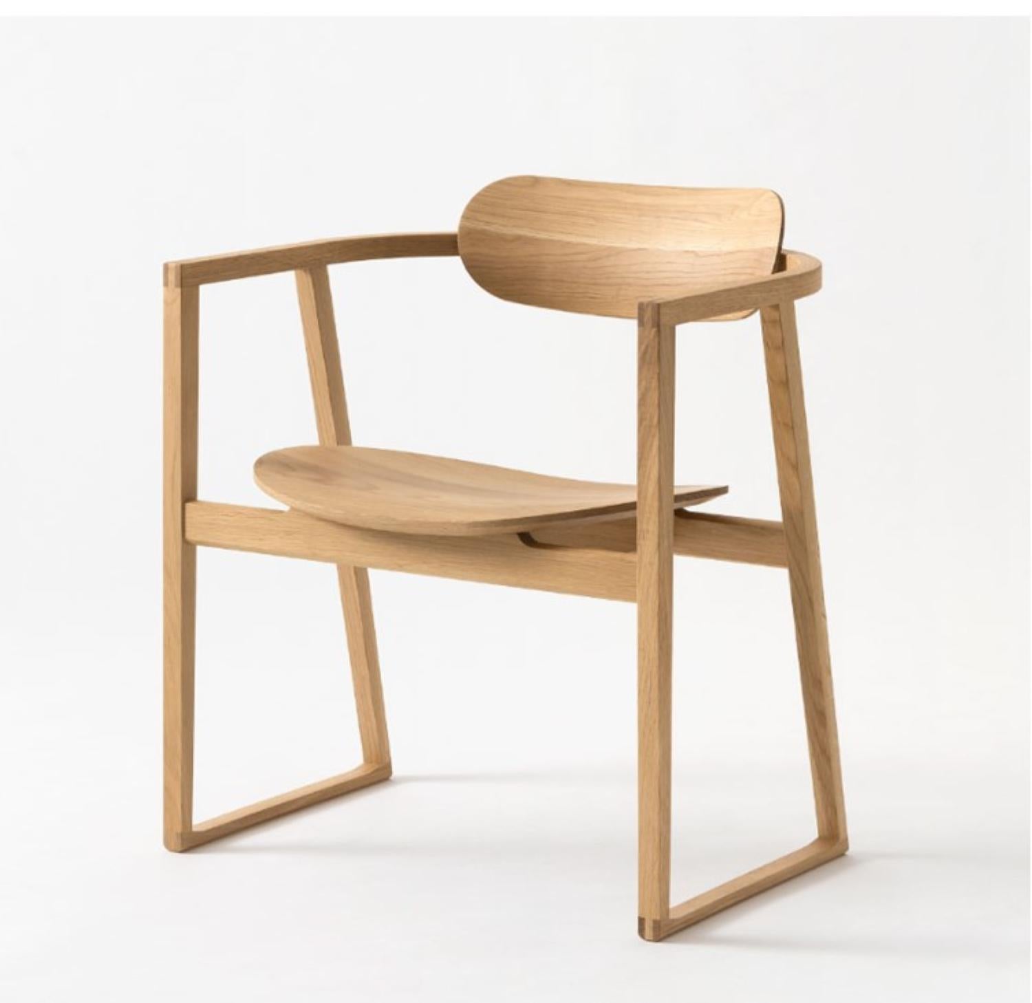 A truly beautiful lounge chair hand crafted in solid oak by HIDA Japan.  The Suwari series is designed with an awareness of vertical flow, blending naturally into both Japanese and modern architectural spaces, and enhancing them.
The weighted design
