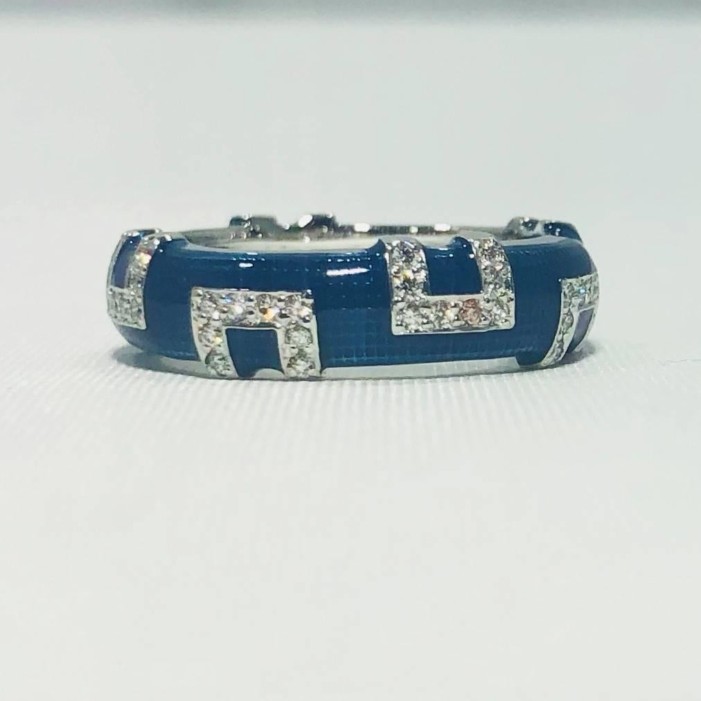 Hidalgo 18 karat white gold and diamonds with bright blue enamel band ring. This is a brilliant classic Hidalgo creation. Known for their enamel work and stackable band rings, Hidalgo is a collectible and most valuable piece to own. This ring is 18