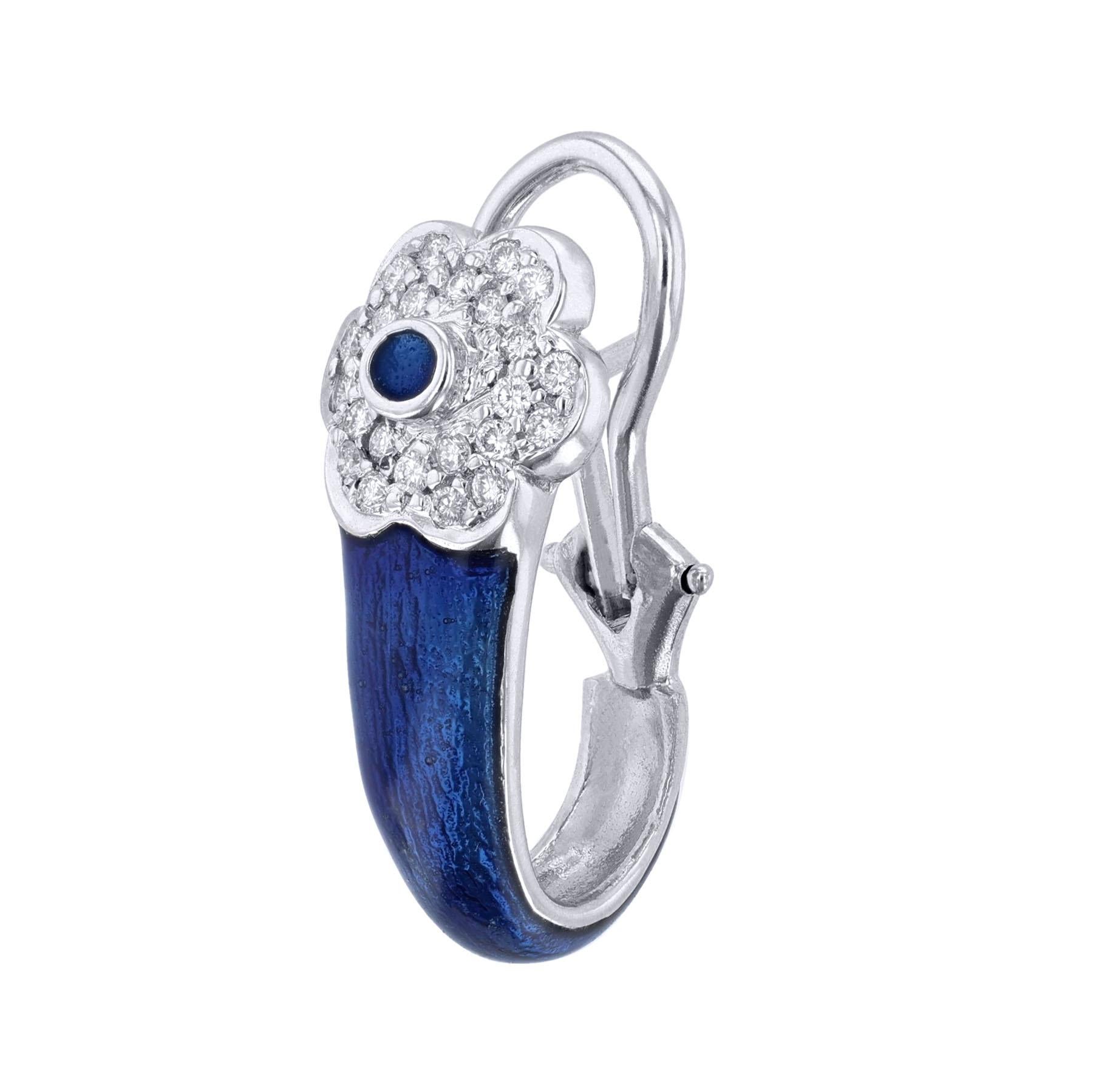 These clip on earrings are made in 18K white gold and blue enamel. It features a flower design with 0.48 carat diamonds.