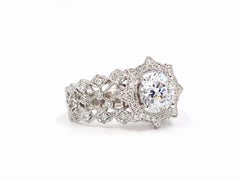 Hidalgo 18 Karat White Gold Star Halo and Lace Diamond Setting