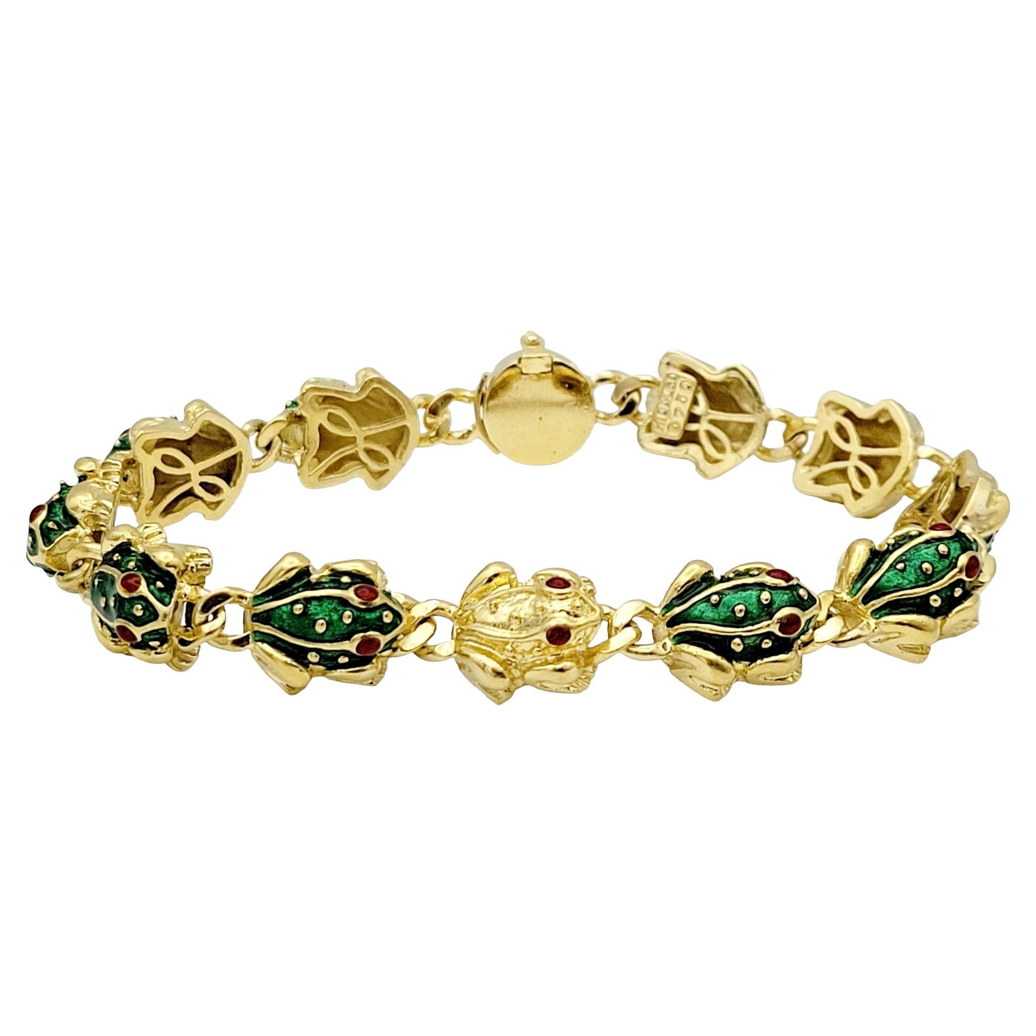 Hidalgo 18 Karat Yellow Gold 3D 11 Frog Link Bracelet with Green & Red Enamel 