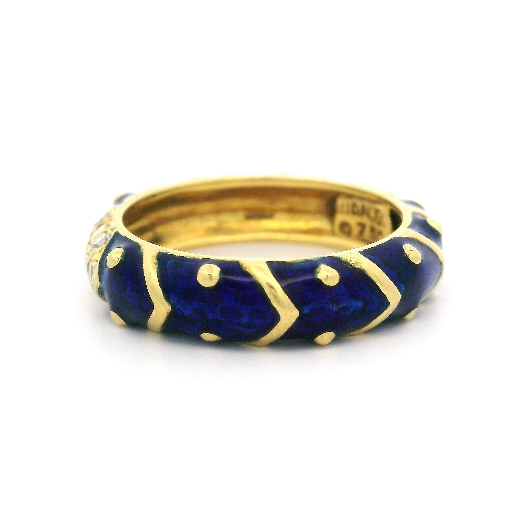 -- Stone(s):
(10) Natural Genuine Diamonds - Round Brilliant Cut - Pavé Set - G/H Color - VS1/VS2 Clarity - 0.15ctw (approx.)

Material: 18k Solid Yellow Gold - Royal Blue Enamel
Weight: 5.5 Grams
Ring Size: 6.5 (Fitted on a finger. Ring can not be