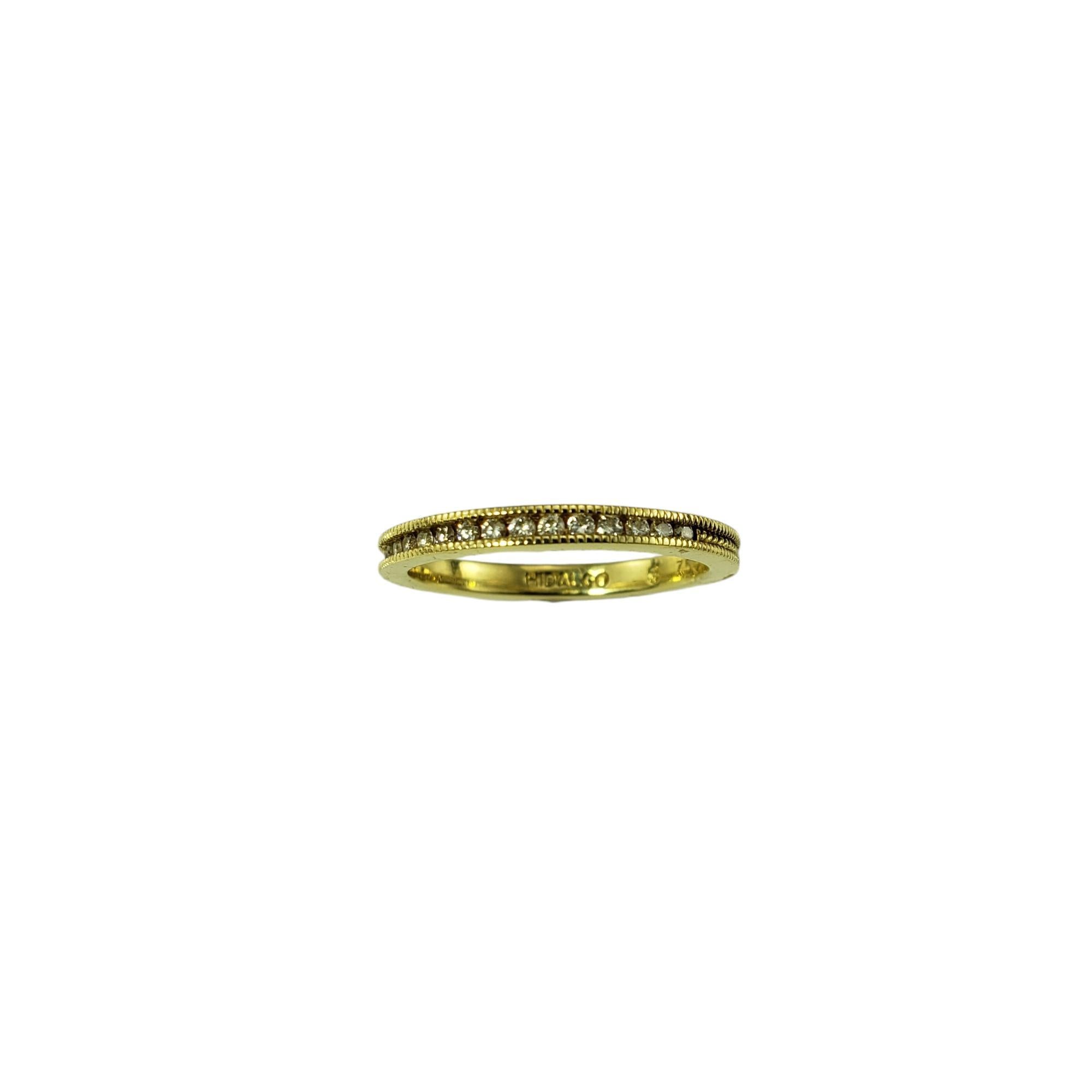 Hidalgo 18K Yellow Gold Diamond Band Ring Size 6.75-

This sparkling Hidalgo band by features 21 round brilliant cut diamonds set in beautifully detailed 18K yellow gold with milgrain design. 

Width: 2.5 mm.

Approximate total diamond weight: .15 -