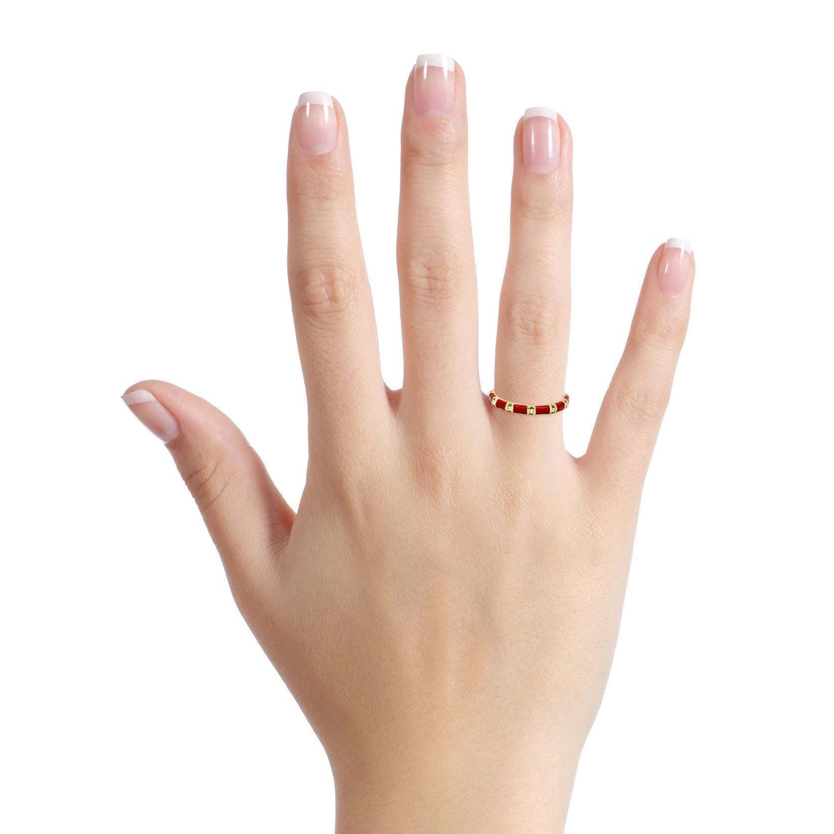 Hidalgo band ring in 18-karat yellow gold with red enamel and diamonds. 

Size, 6.5
Width, 2.5mm
Depth, 2mm
Weight, 3.2 grams
Diamond Total Carat Weight, .03 carat 