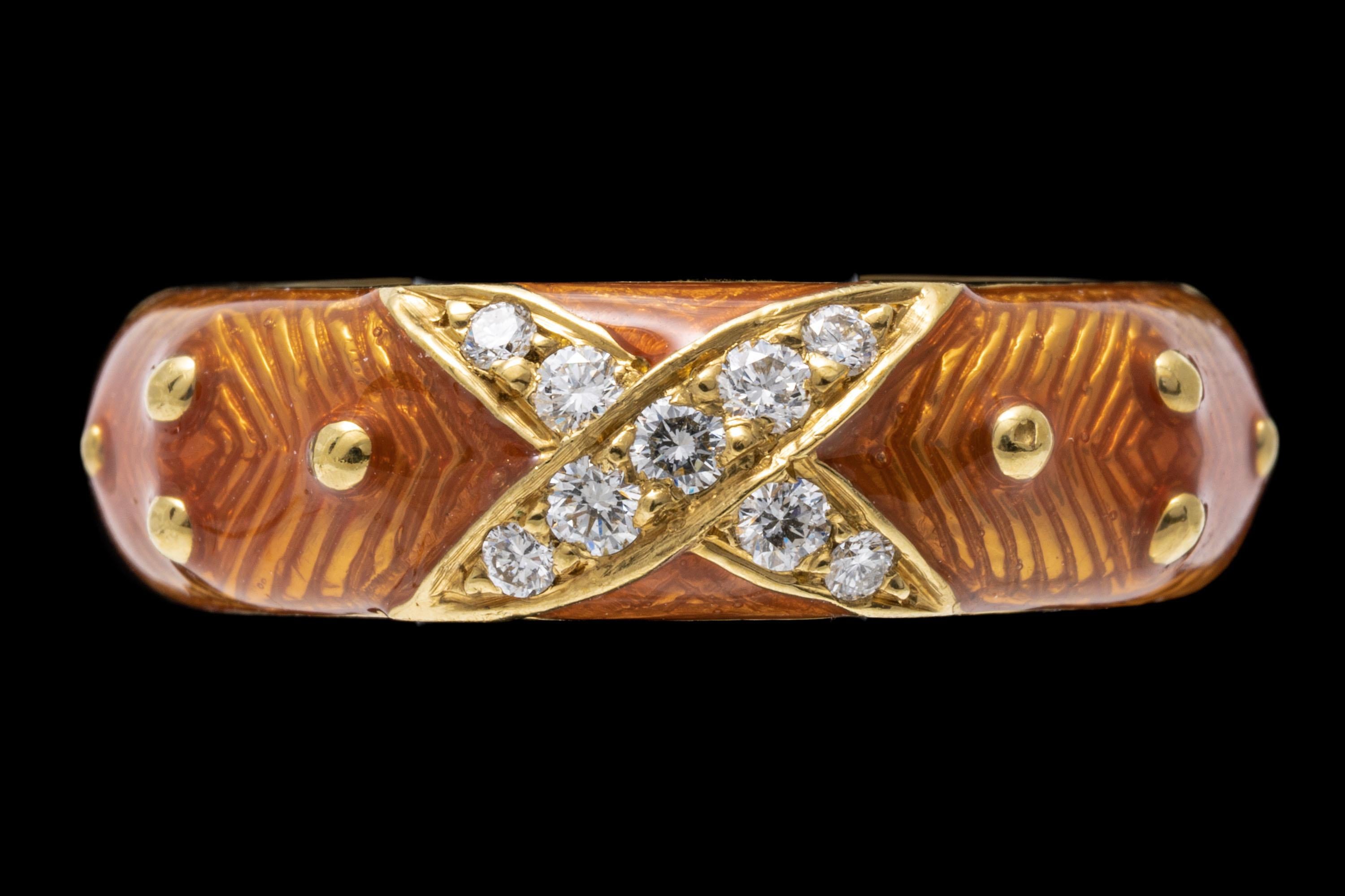 18k yellow gold ring. This beautiful ring is by HIdalgo, and has a peach guilloche enamel top, decorated with a center 