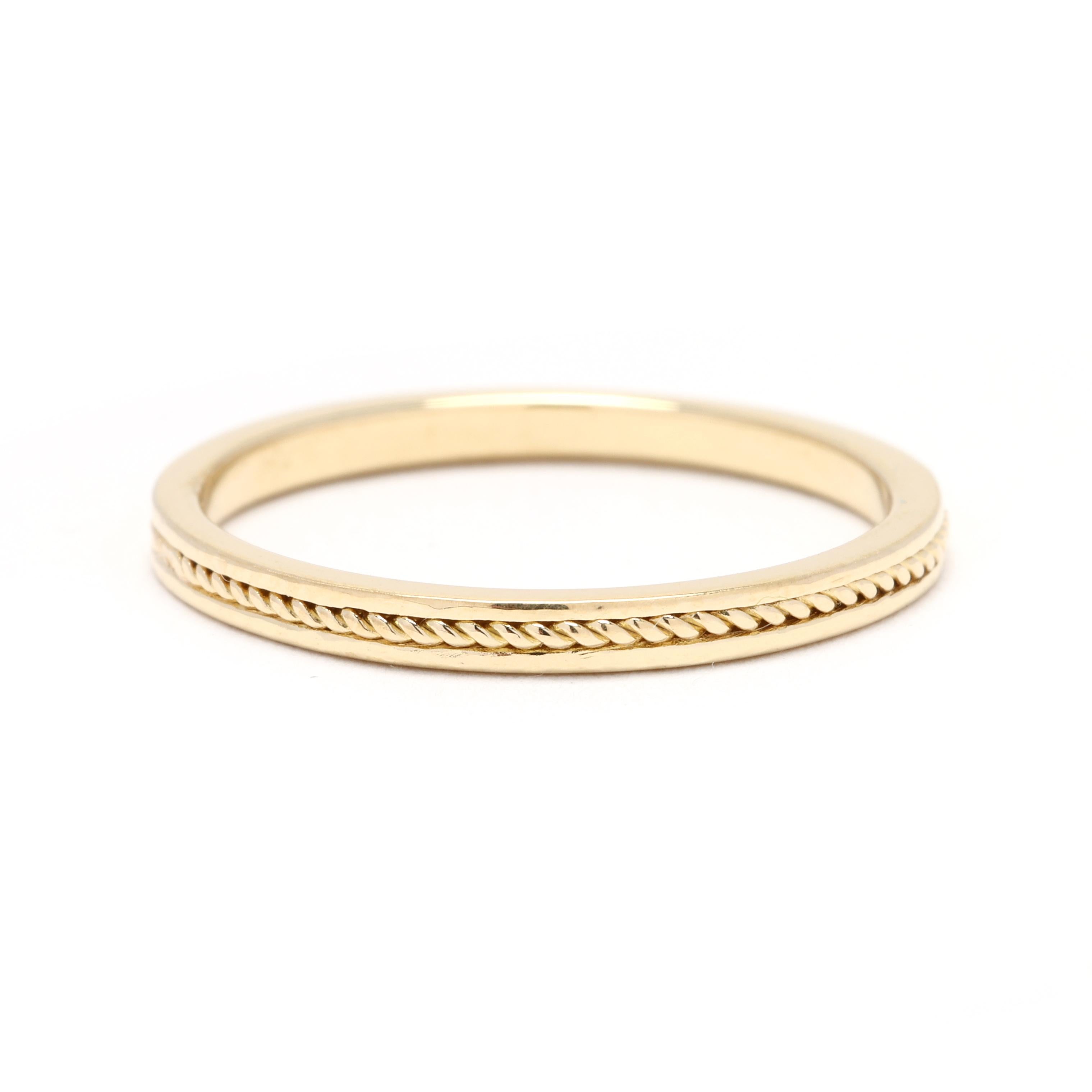This minimalist 14k white gold rope band ring is the perfect accessory for adding a touch of elegance to any outfit. Made with solid 14k white gold, this ring is both durable and high-quality. The rope band design adds a modern and sleek touch,