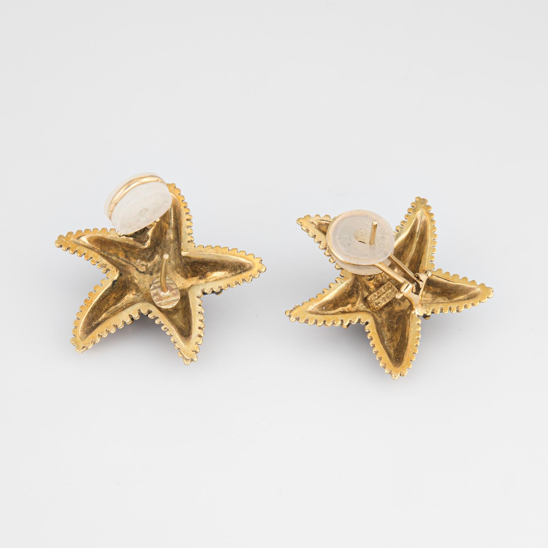 Finely detailed pair of estate Hidalgo starfish earrings, crafted in 18k yellow gold. 

The earrings retailed for an estimated $3,790.00.  

The charming earrings feature black enamel set into the pierced starfish design. The stylish earrings can