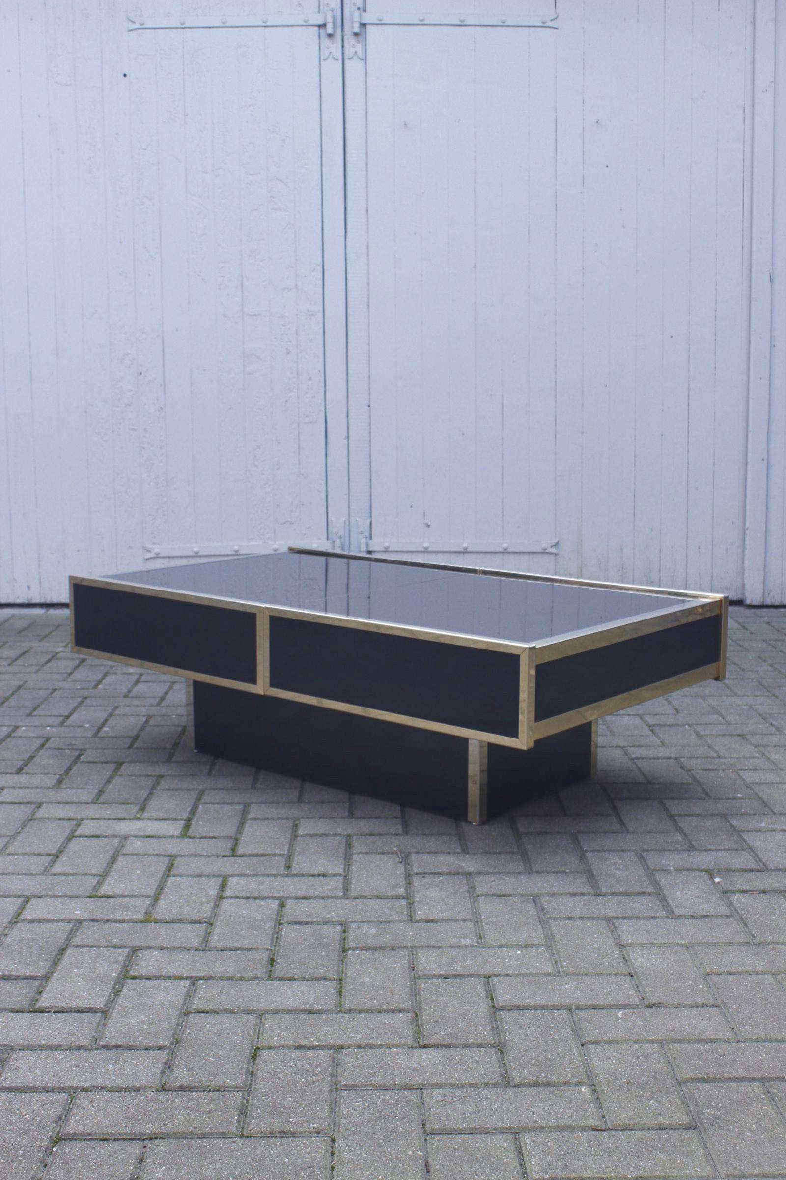 French Hidden bar coffee table in glass & gilded metal by Maison Lancel, France 1970s For Sale