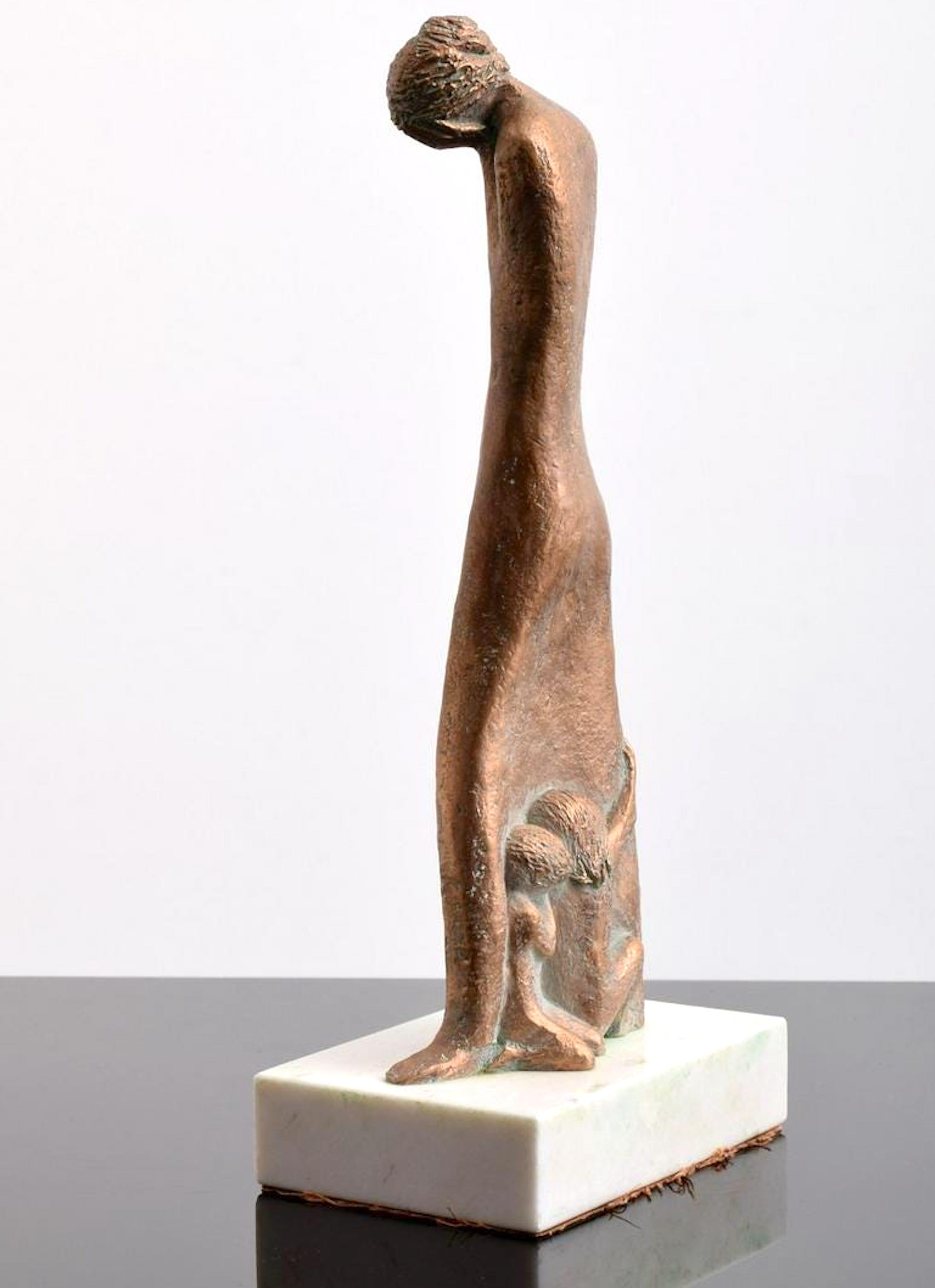 Bronze, signed on rear leg, featuring two children hiding in their mother's dress.
Measures: 14