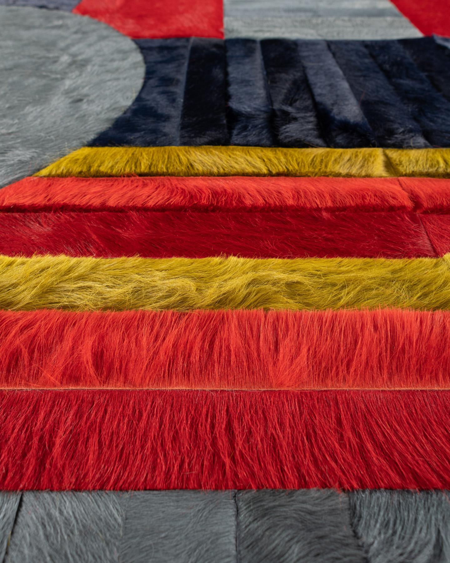Ce tapis Atlas Hide a été conçu en Collaboration entre Kyle Bunting et le photographe Douglas Friedman.
 

 A propos du Design/One :
 Atlas, une Collectional créée en collaboration avec le photographe Douglas Friedman, est le reflet du terrain vaste