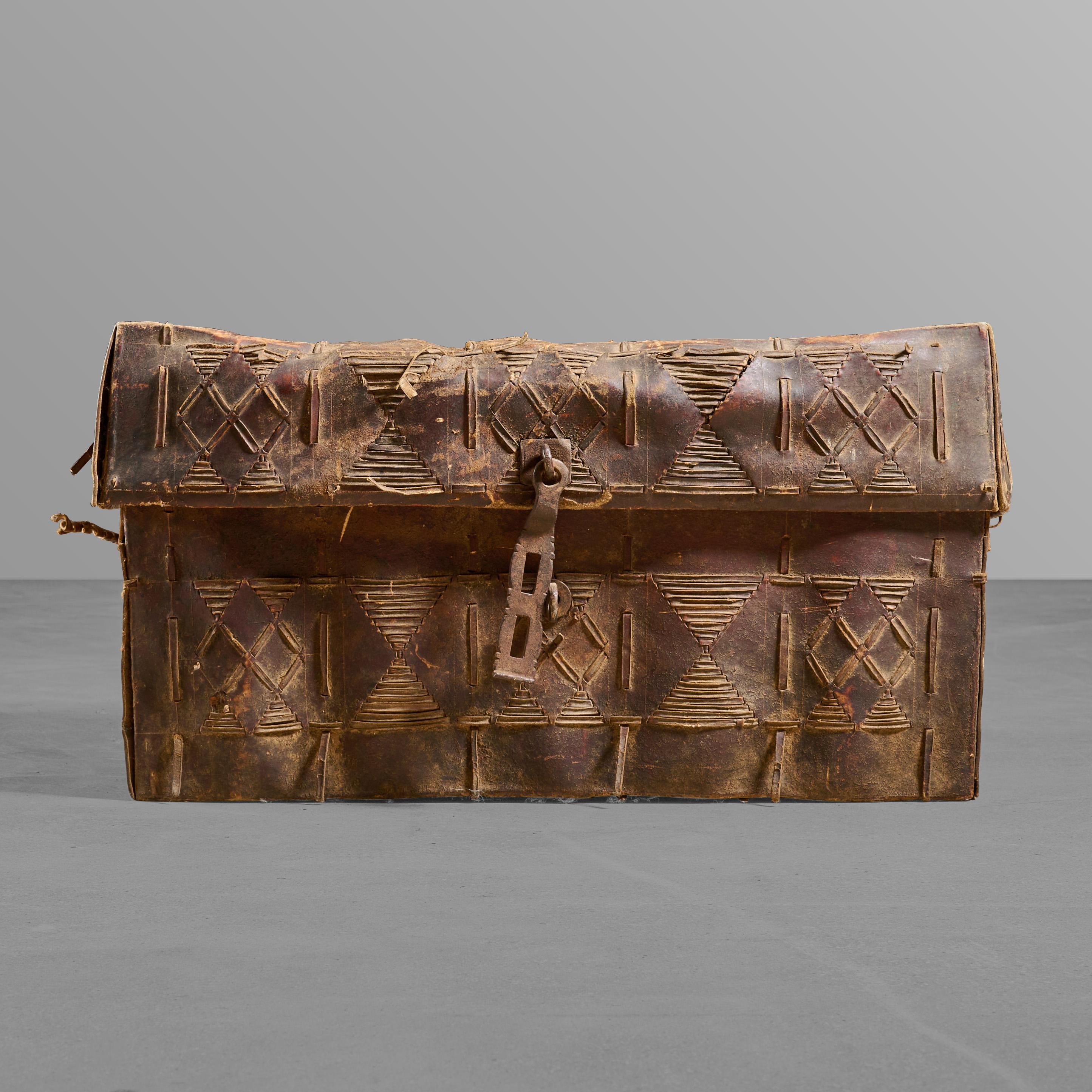 Hide trunk made by gauchos for storage and travel. Nice clasp.

