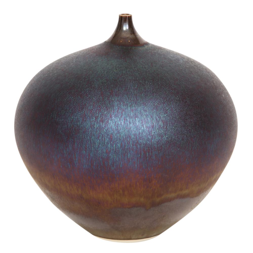 Hideaki Miyamura vase, porcelain, iridescent, signed. Medium scale vase with clay body and iridescent glaze with a range of colors from violet and blue to orange and red. Signed on underside of the vase. Mr. Miyamura confirmed in a email that the