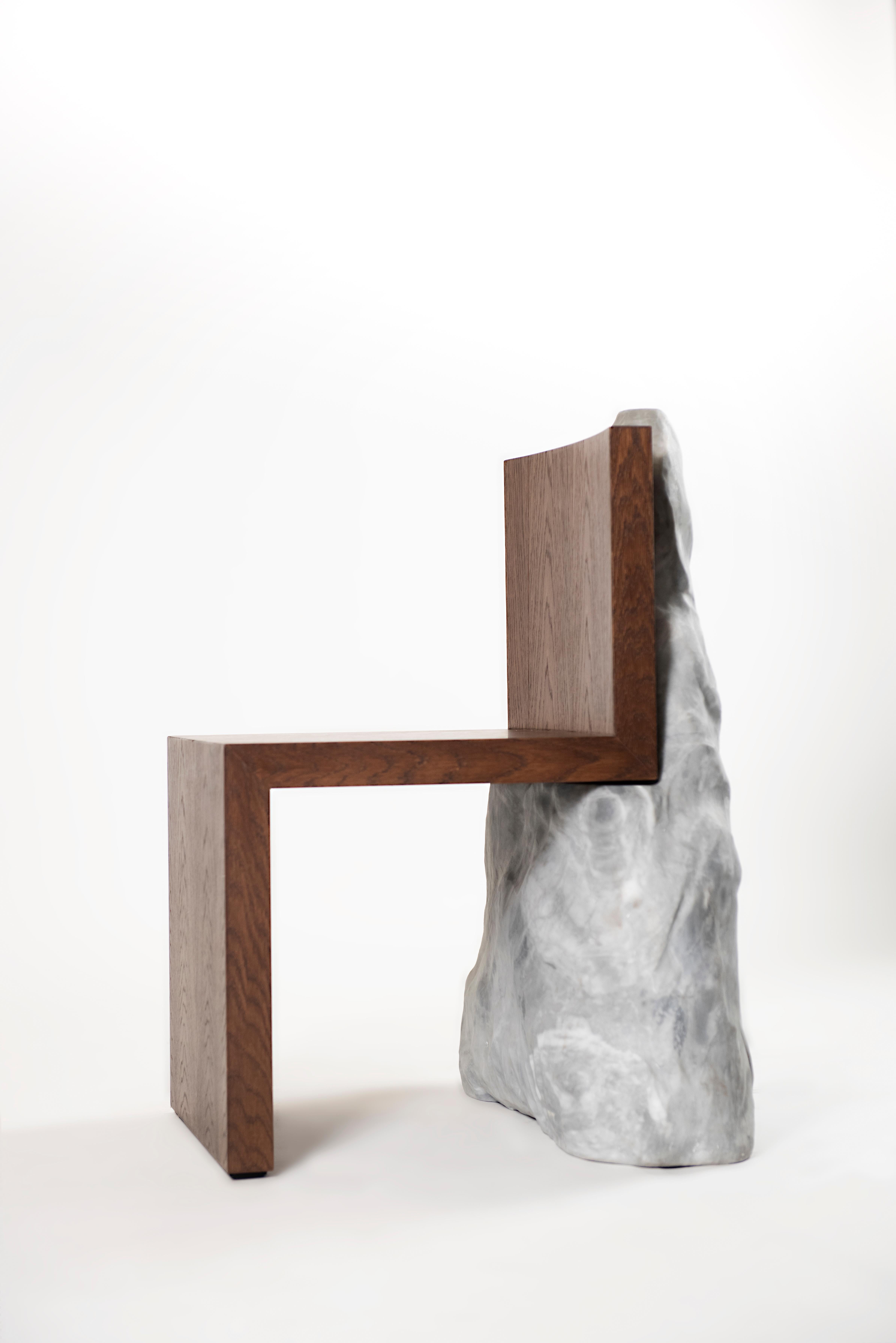 High Atus Chair by Bea Interiors
One of a Kind.
Dimensions: D54 x W 65 x H 86 cm.
Materials: Black walnut wood and marble. 

The High Atus Chair was designed with an eye for the raw strength of marble sourced from Portugal, which has been