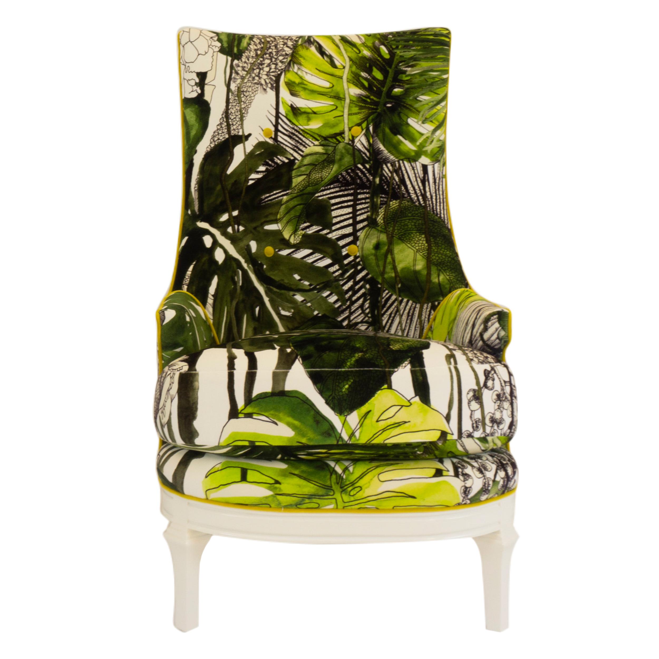New vintage-Inspired high back upholstered accent chair with rounded base, deep feather-filled seat and tapered legs. The chair is shown in a Christian Lacroix vibrant velvet palm foliage print. Small accent buttons and welting in yellow velvet