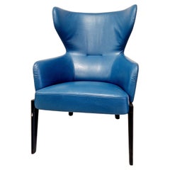 Fauteuil Rodolfo Dordoni à haut dossier en cuir bleu
