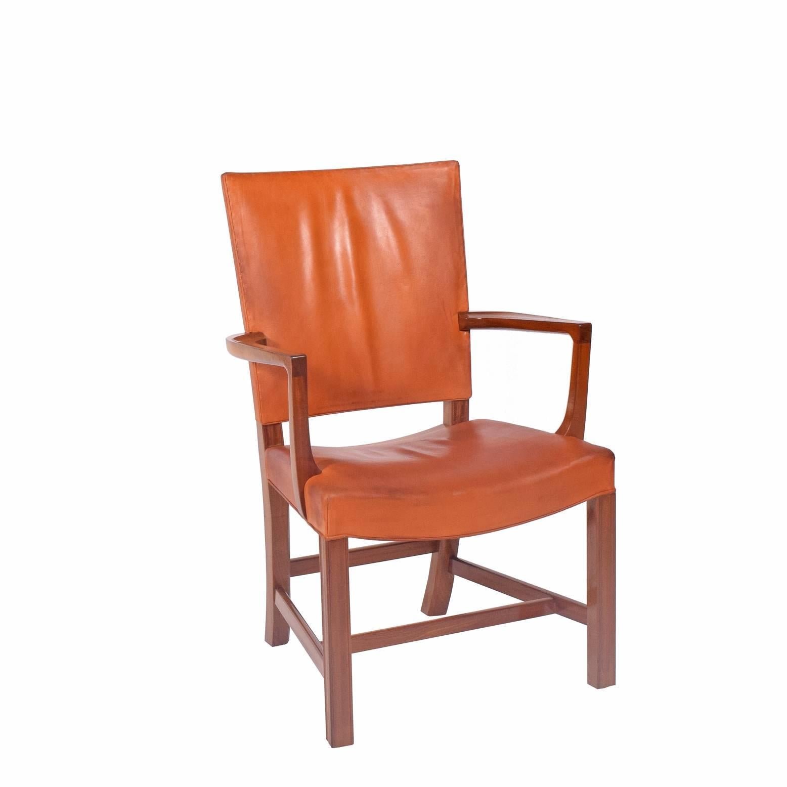 Mahogany and leather high back armchair. Awarded a prize at the Barcelona World Fair in 1929. Kaare Klint's design was inspired by English furniture maker Thomas Chippendale. Original paper label from Rud. Rasmussen cabinetmaker.