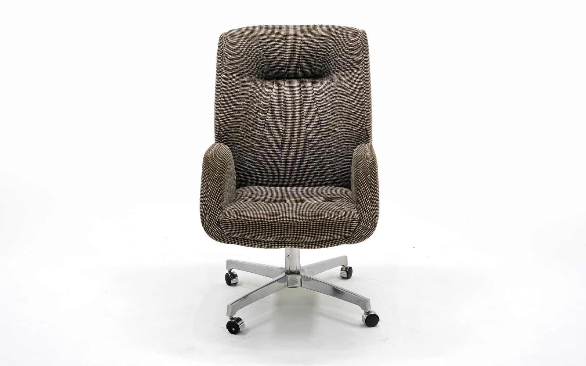HIgh back executive desk chair made by Thonet, 1960s.  Tilt, 360 degree swivel and very comfortable.  Retains the original tweed upholstery in very good condition.  Signed.  Ready to use.