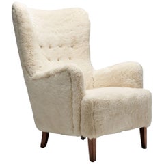 High Back Easy Chair in Sheepskin with Stained Beech Legs, Scandinavia, 1950s