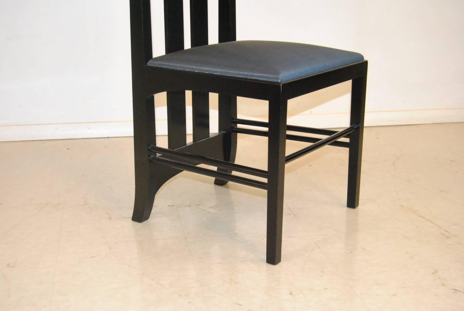  This black lacquered high back chair was designed by Charles Rennie Mackintosh and produced posthumously sometime, circa 1970. The chair was produced by Cassina in solid ash with ebony finish. The chairs name is taken from the Ingram tea rooms in