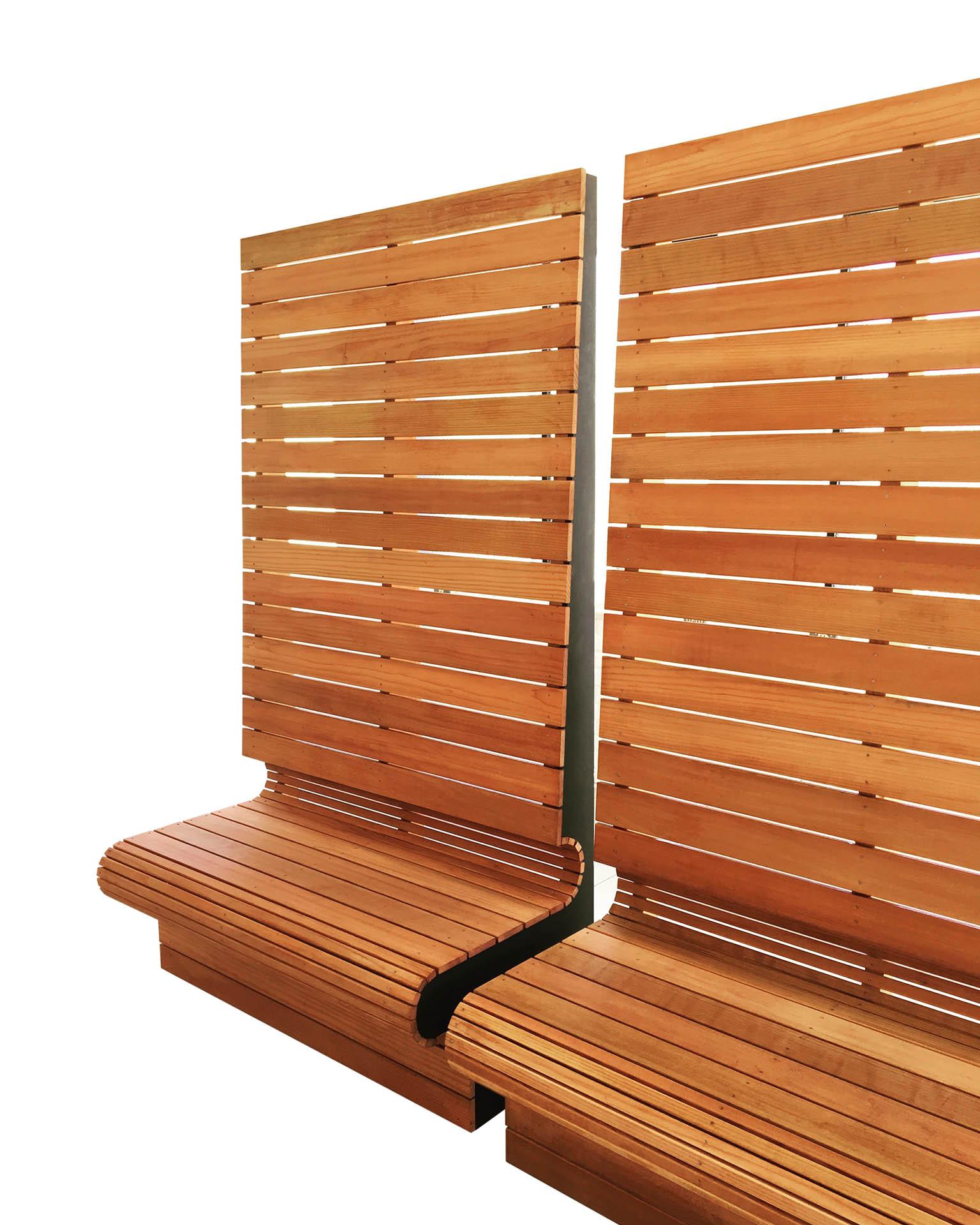 Redwood slats undulate from bench to fence to create a simple lattice of privacy and relaxation. Sold in four foot wide sections. Multiple sections can be bolted together to create a single long linear banquette for outdoor dining or resting.