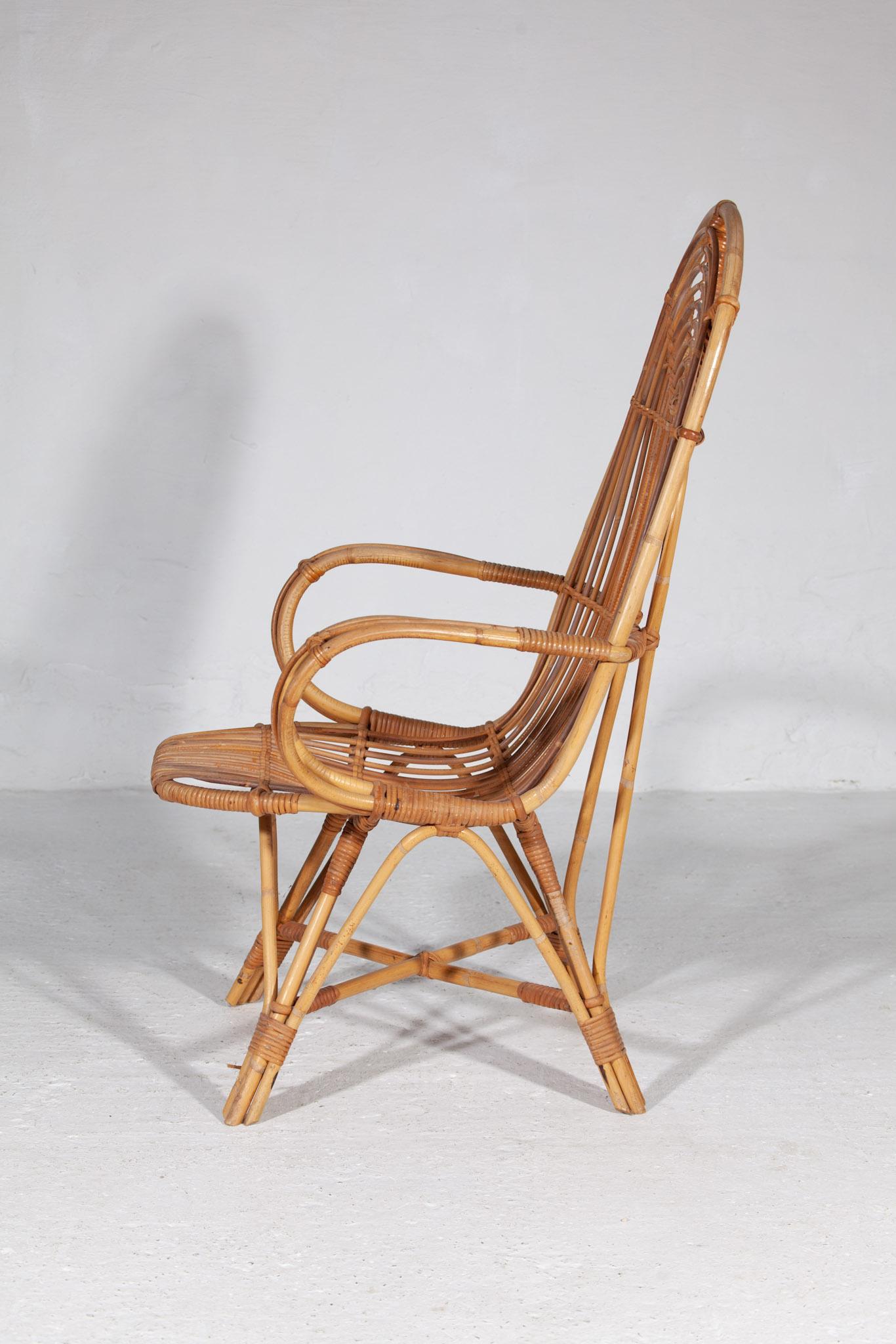 Magnifique fauteuil en rotin Rohe Noordwolde à haut dossier datant des années 1950. Le fauteuil en osier est en bon état et très confortable. Cette chaise à haut dossier en rotin attire tous les regards à l'intérieur. La chaise vintage en rotin
