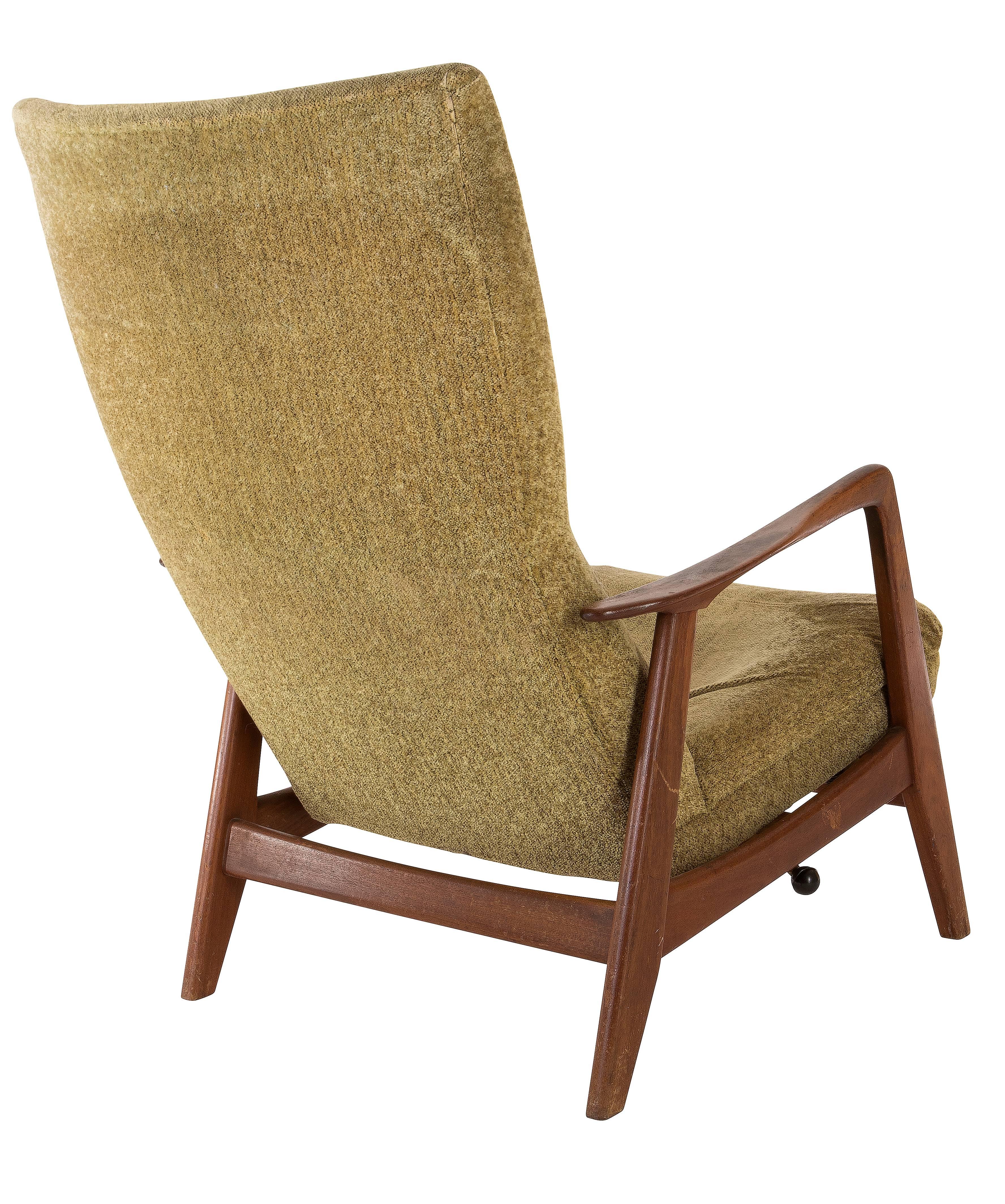 Adjustable high back recliner with original fabric, designed by Folke Ohlsson, manufactured by DUX, Sweden, circa 1960s.

Unrestored item, please note slight tear on the buttoned back area.