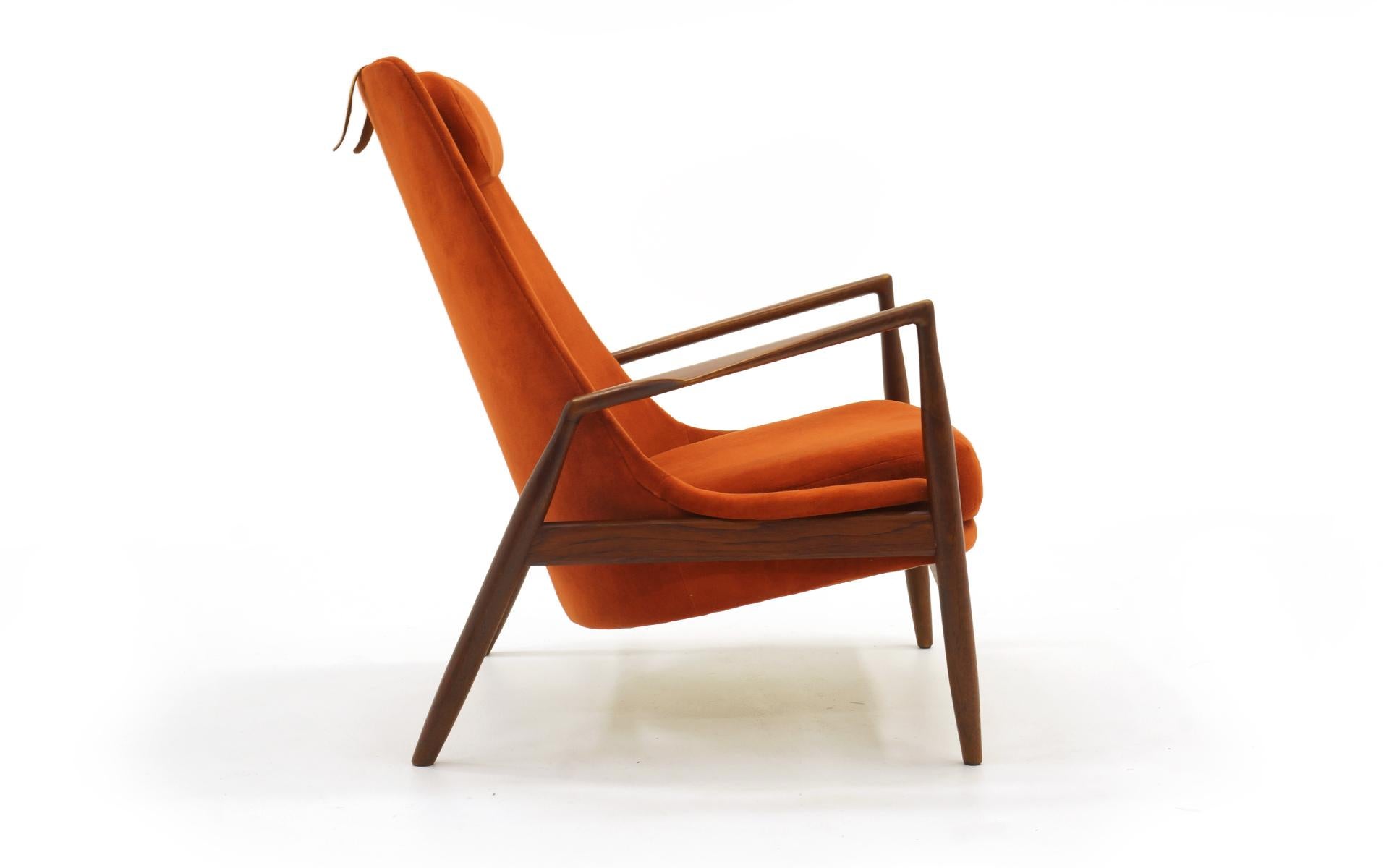 High back lounge chair in Teak with burnt orange velvet by ib Kofod Larsen for OPE, Sweden. Also see our listing for a pair of complimenting Seal chairs, one in burnt orange like this and one in the same fabric, but brown color. The fabric feels