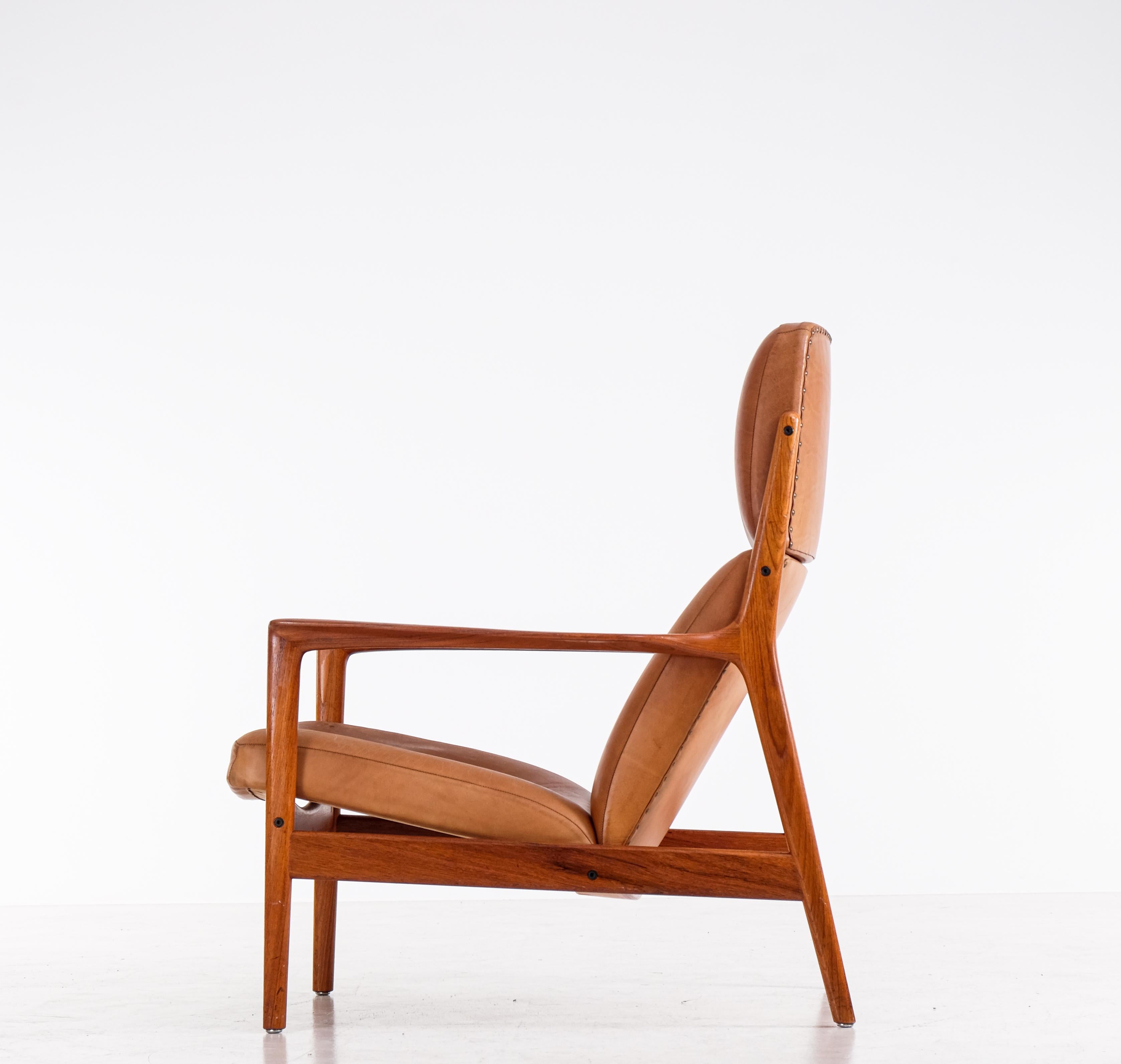 Swedish High-back 'USA-75' armchair by Folke Ohlsson for DUX, 1960s For Sale