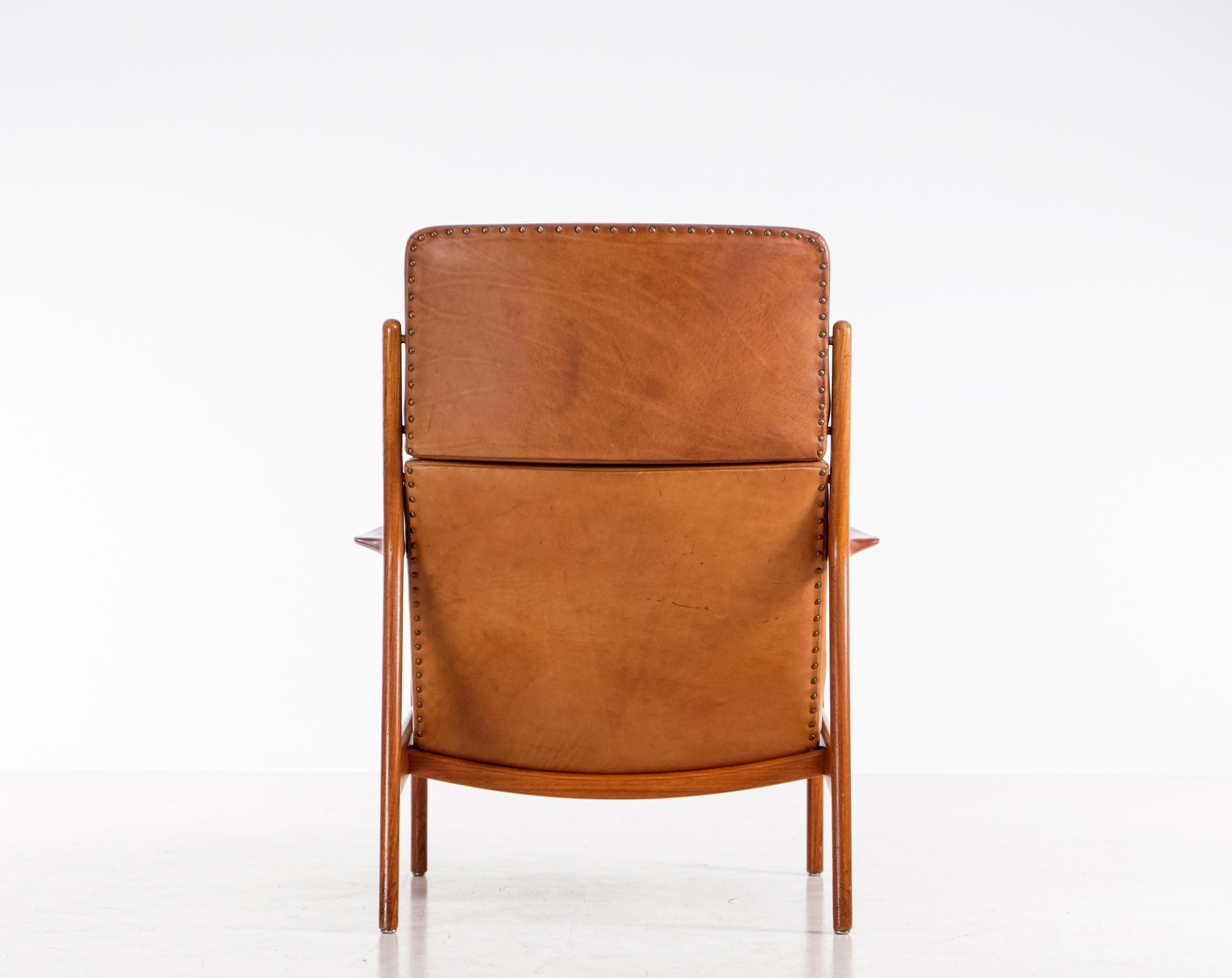 Mid-20th Century High-back 'USA-75' armchair by Folke Ohlsson for DUX, 1960s For Sale