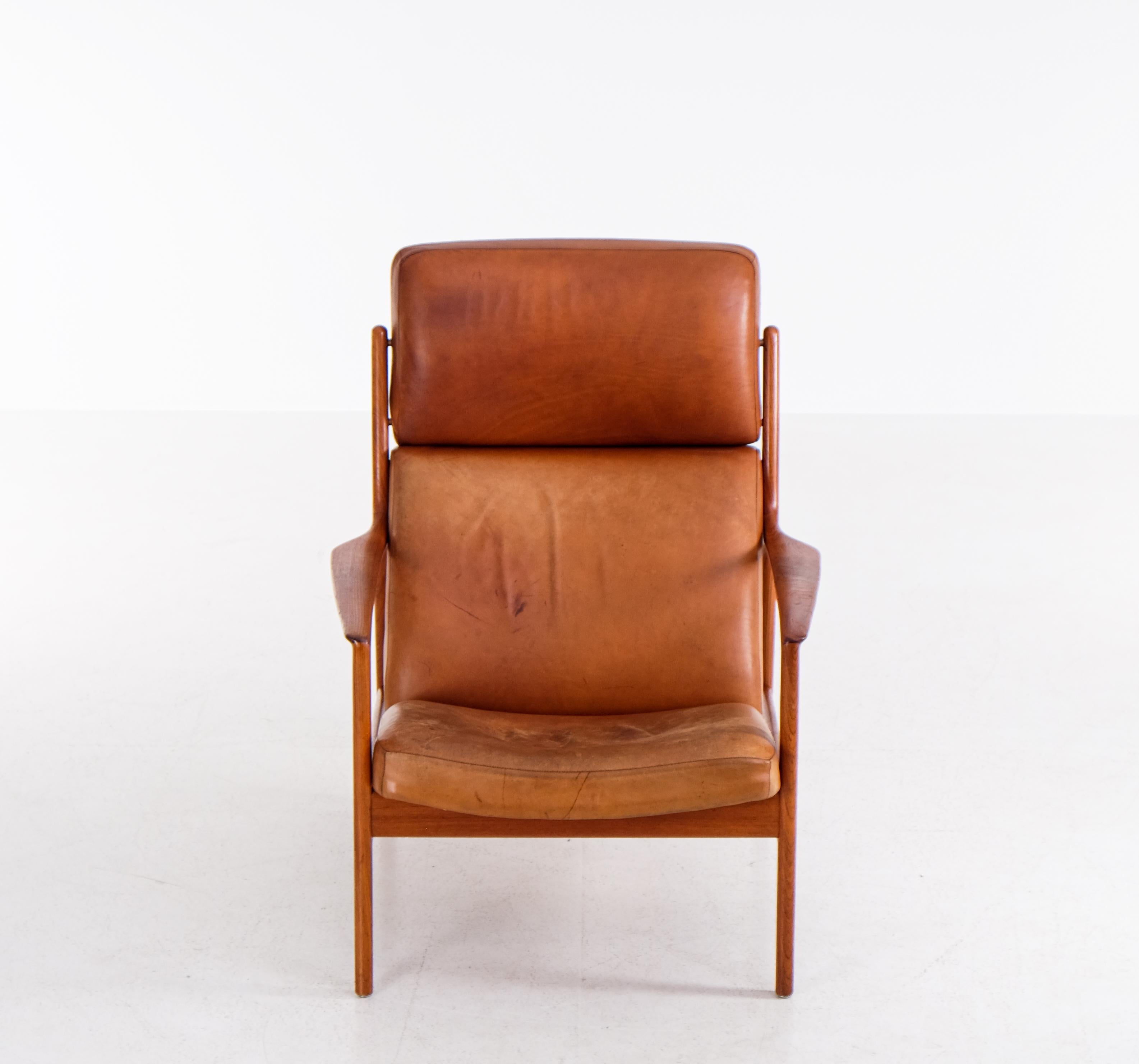 Walnut High-back 'USA-75' armchair by Folke Ohlsson for DUX, 1960s For Sale