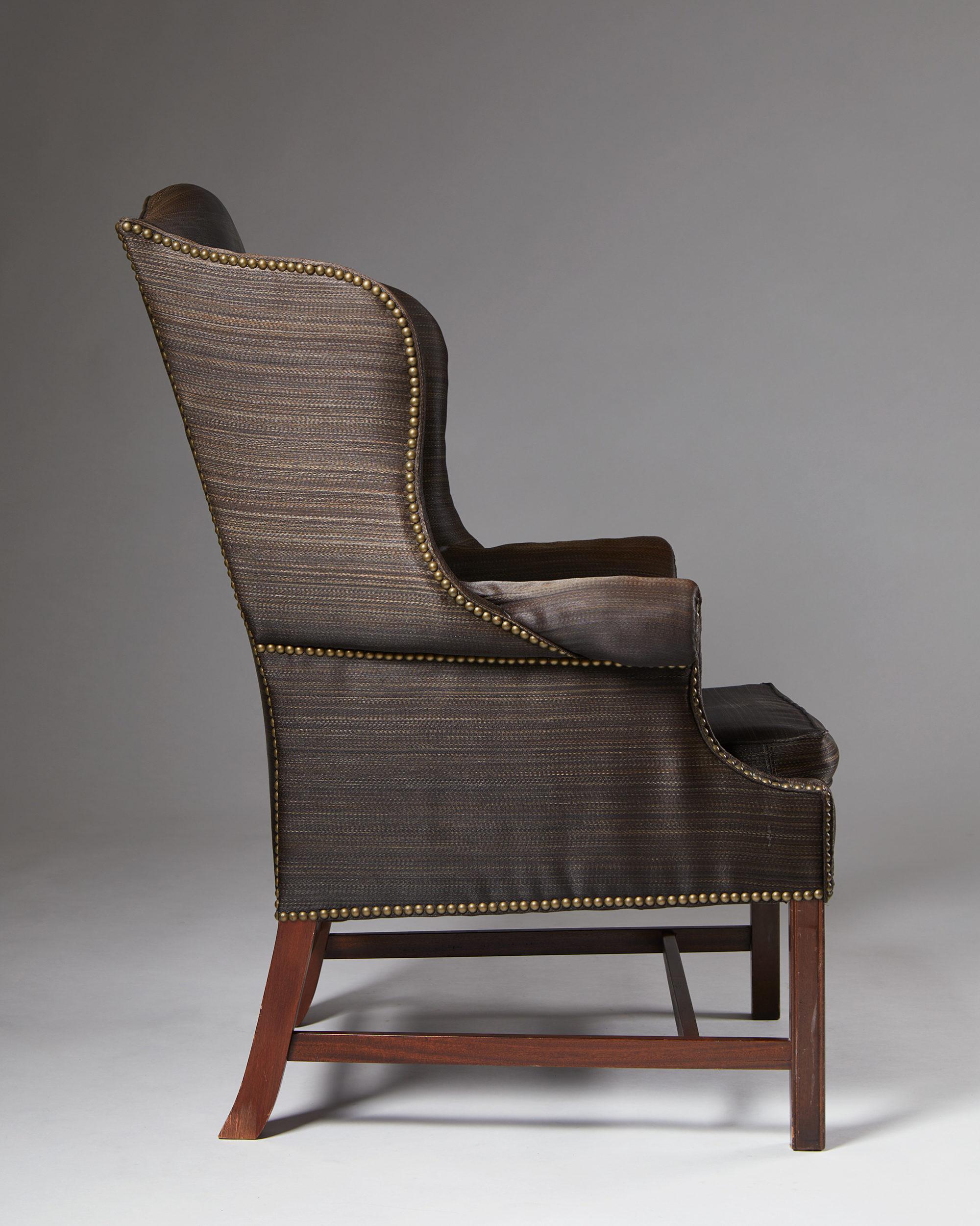 High-back wing chair, anonymous, Denmark, 1950s.
Mahogany and horsehair.

Measures: H: 110.5 cm/ 3' 7 1/2