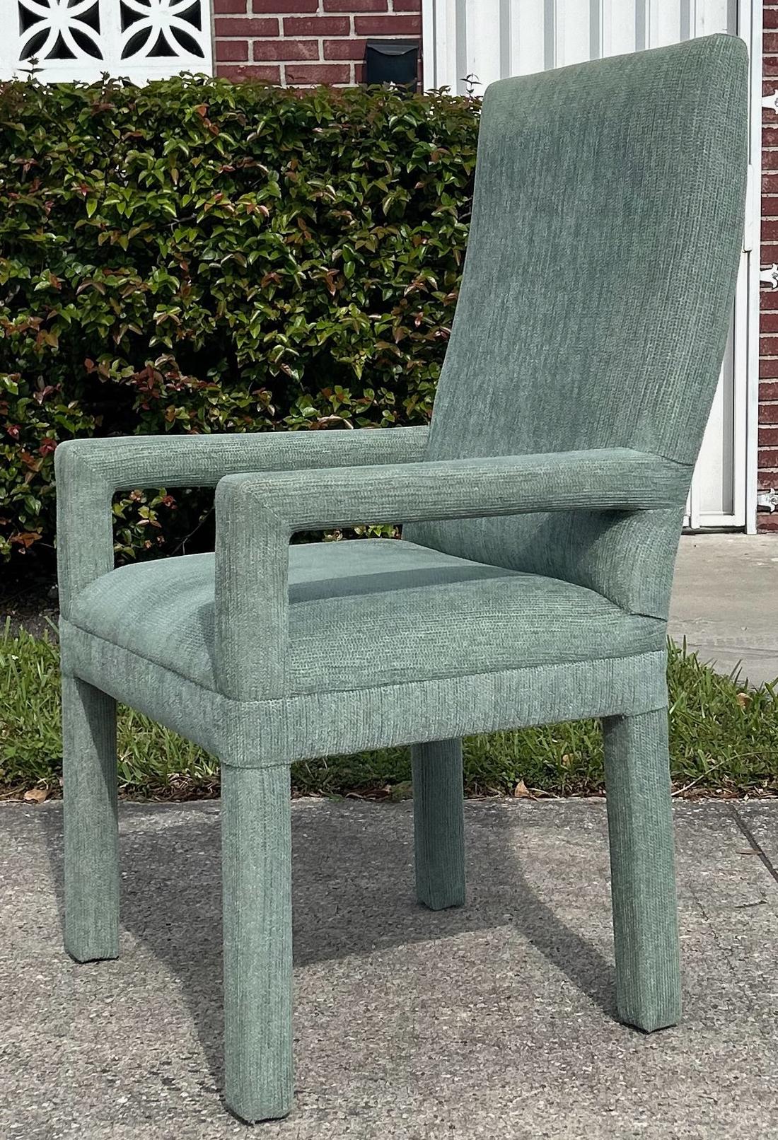 High-backed, Large Scale Upholstered dining chairs, Set of 6 (2 Arms, 4 Sides)

Offered for sale is a set of six (two armchairs and four side chairs) over-sized, upholstered Parsons-style dining chairs that are circa 1980. The chairs are tailored