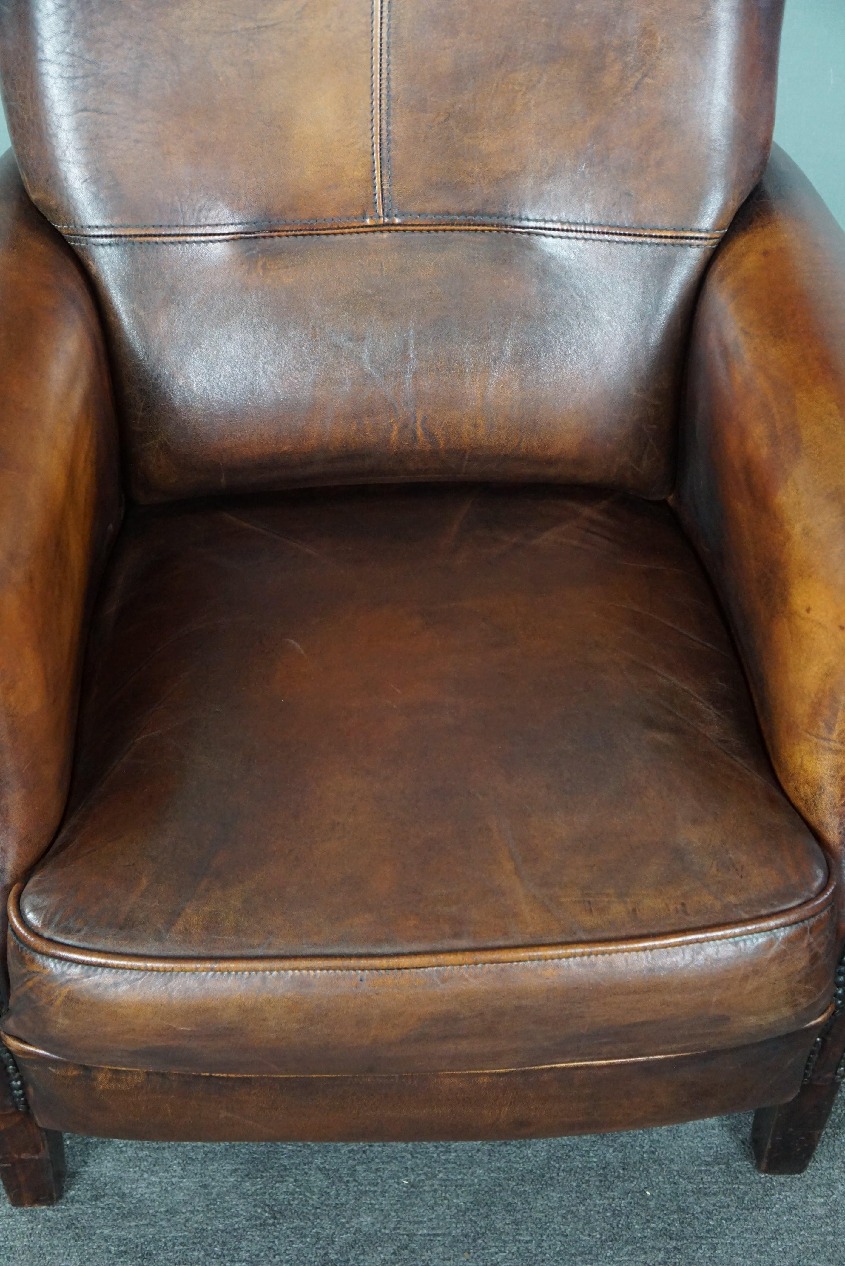 Leather High-backed sheep leather armchair in good condition, stunning colors For Sale