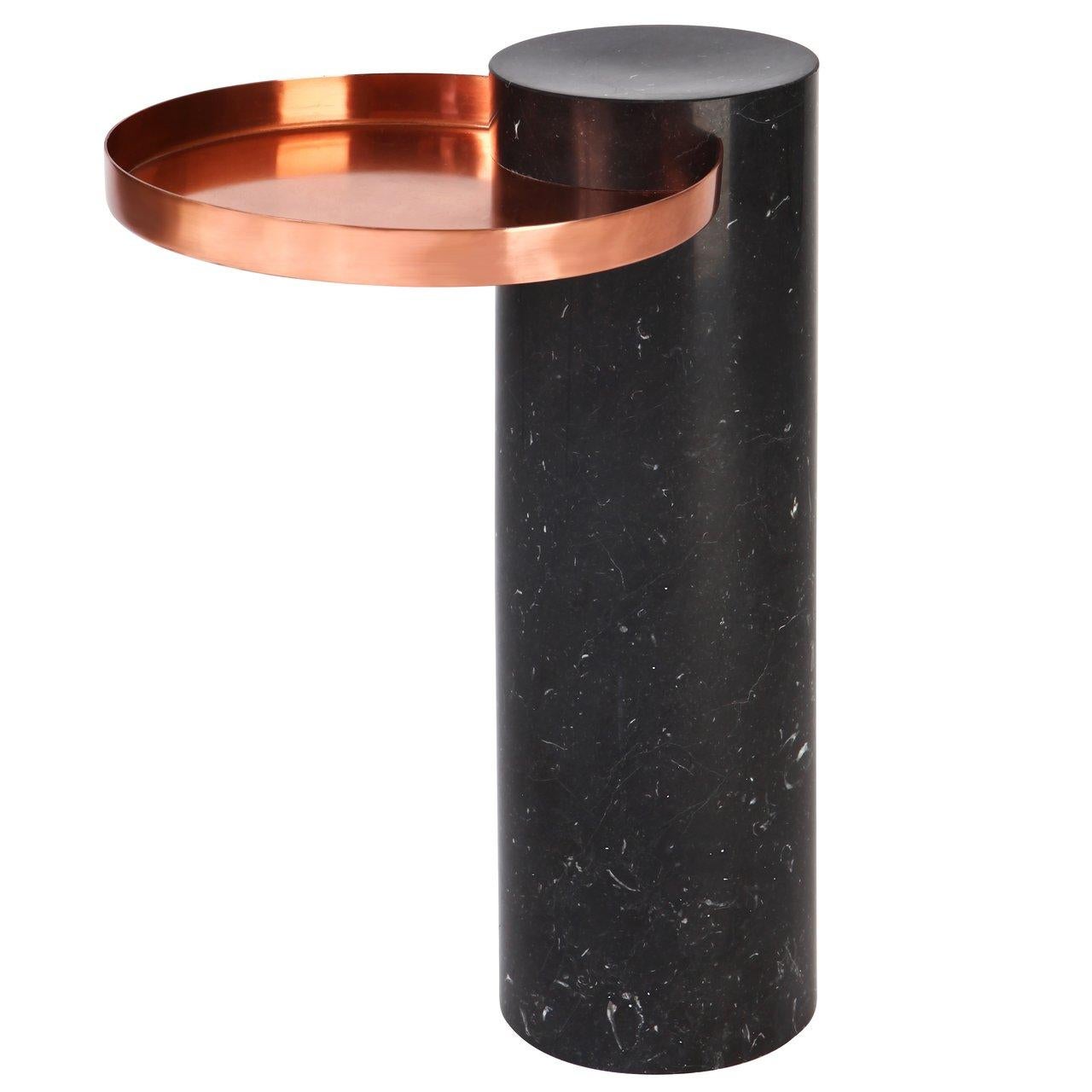 High black marquina marble contemporary guéridon, Sebastian Herkner
Dimensions: D 42 x H 57 cm
Materials: Black Marquina marble, copper

The salute table exists in 3 sizes, 4 different marble stones for the column and 5 different finishes for