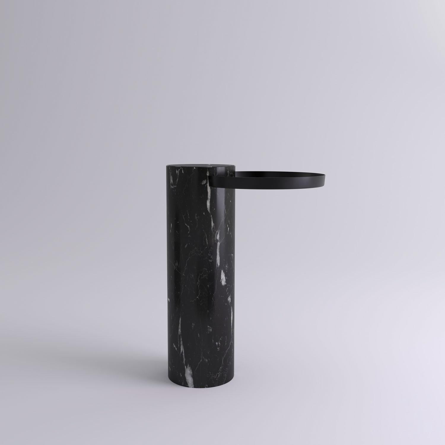 High black marquina marble contemporary guéridon, Sebastian Herkner
Dimensions: D 42 x H 57 cm
Materials: Black Marquina marble, black metal tray

The salute table exists in 3 sizes, 4 different marble stones for the column and 5 different