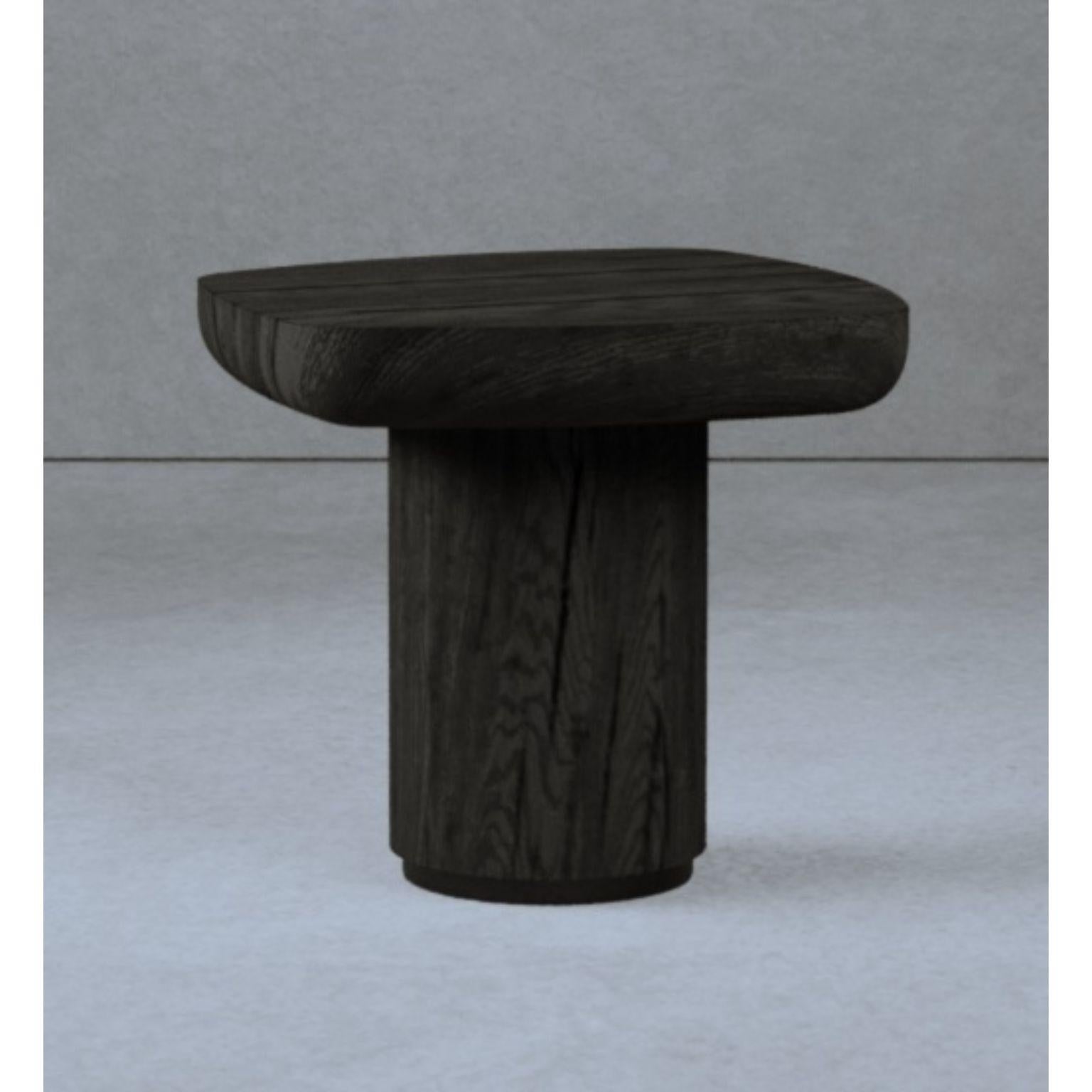 High Blackbird Wood Coffee Table by Gio Pagani
Dimensions: D 50 x W 50 x H 46 cm.
Materials: Fir Wood.

In a fluid society capable of mixing infinite social and cultural varieties, the nostalgic search for reworked aesthetics that unite distant