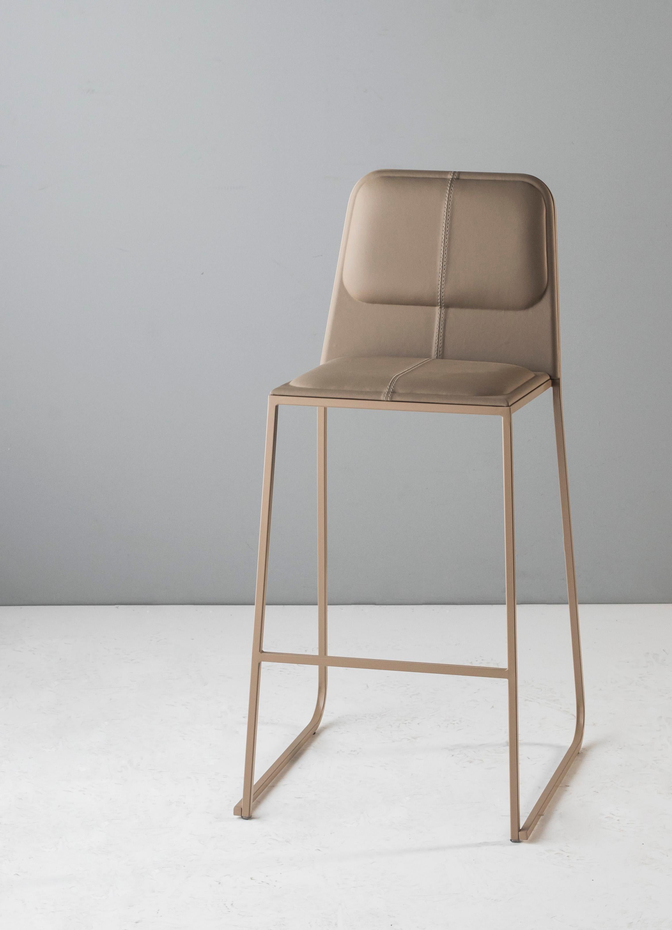 High Bora Bar Stool by Doimo Brasil
Dimensions: W 52 x D 56 x H 108 cm 
Materials: Paint, Natural leather.

Also available in W 52 x D 56 x H 92 cm, Seat Height: 60 cm. 

With the intention of providing good taste and personality, Doimo deciphers